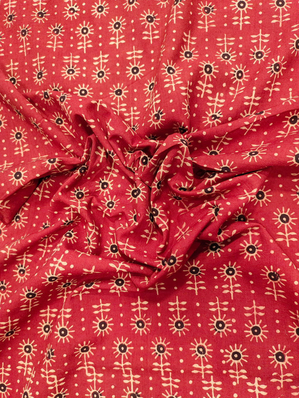 Maroon cotton ajrak print with black and beige.