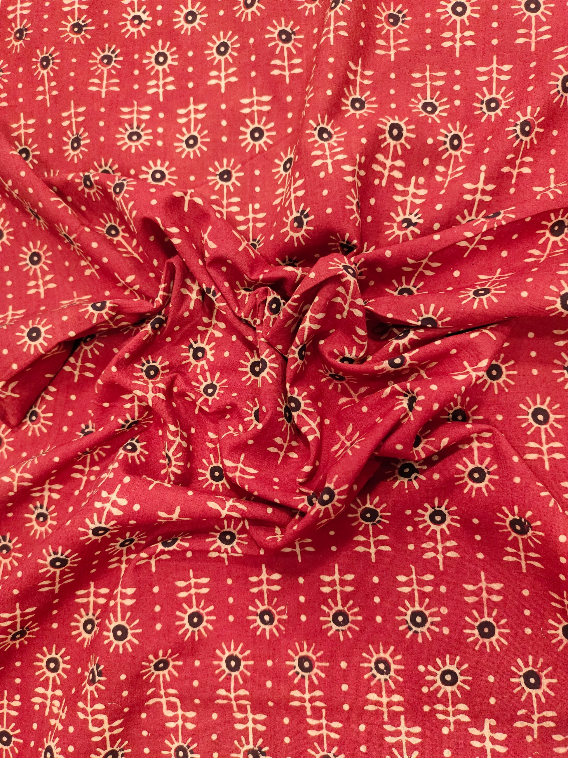 Maroon cotton ajrak print with black and beige.