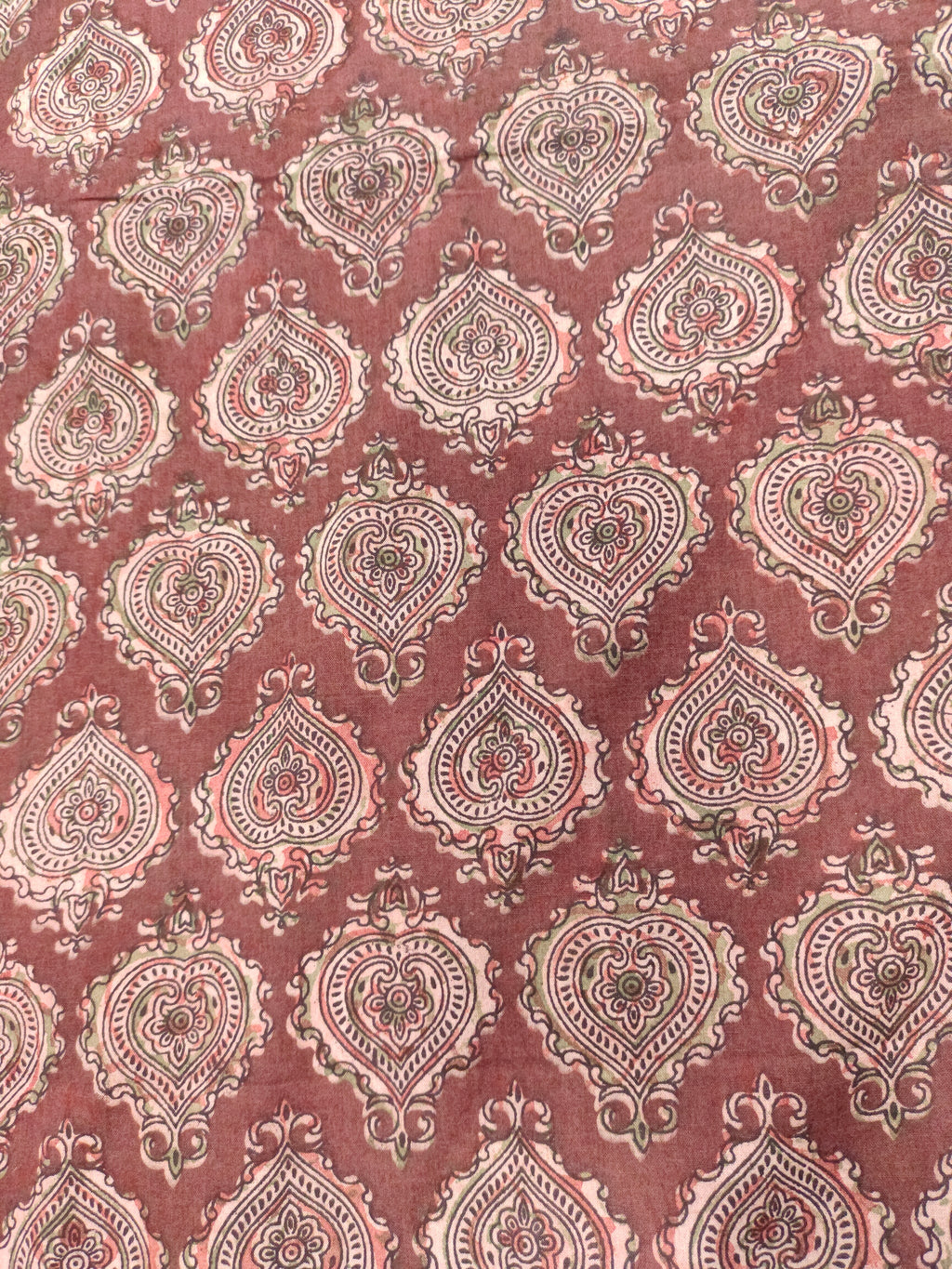 Maroon base ajrak print with black and green.