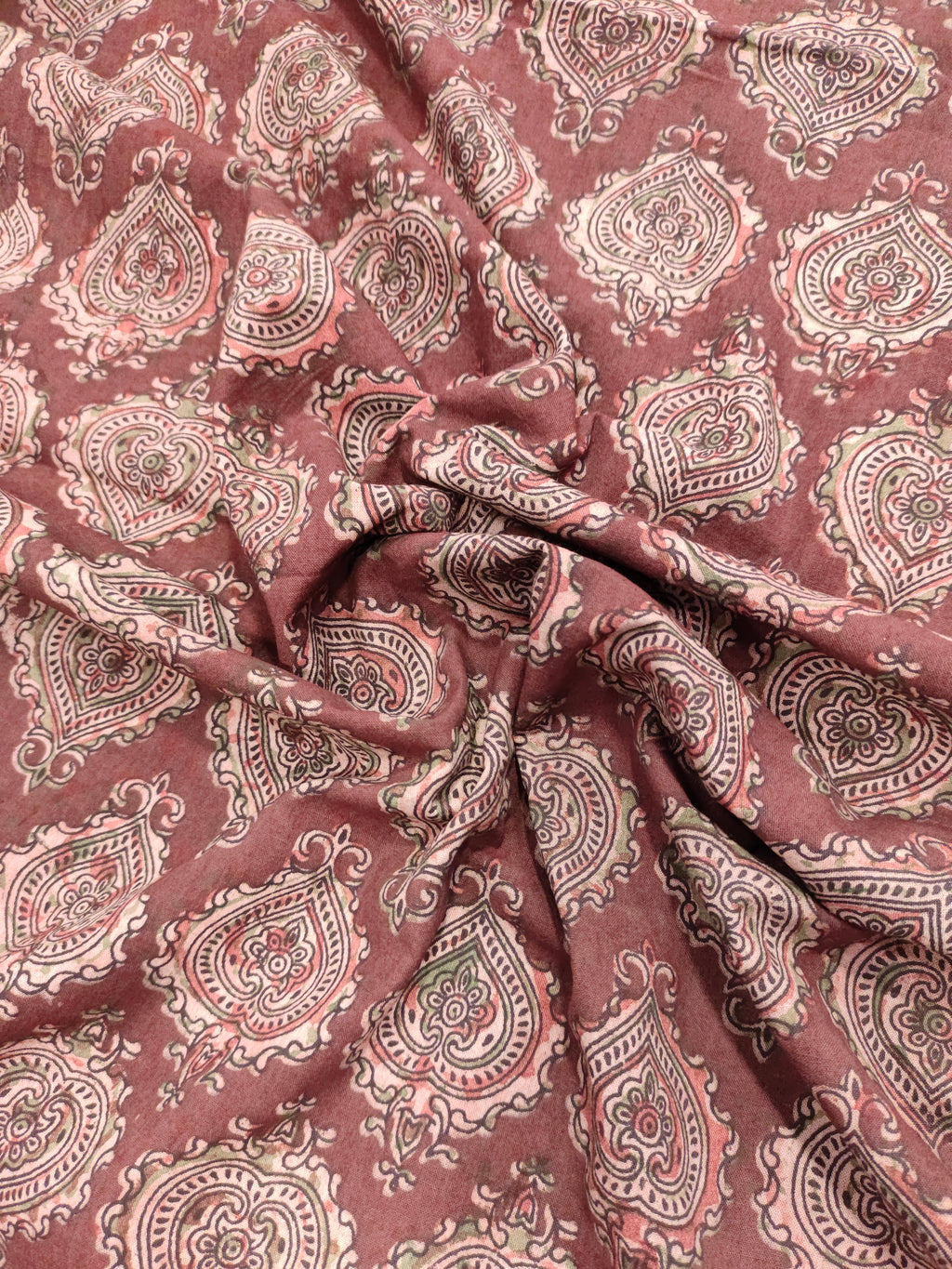 Maroon base ajrak print with black and green.