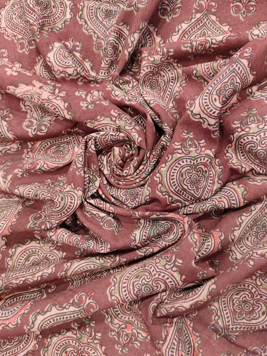 Maroon base ajrak print with black and green.