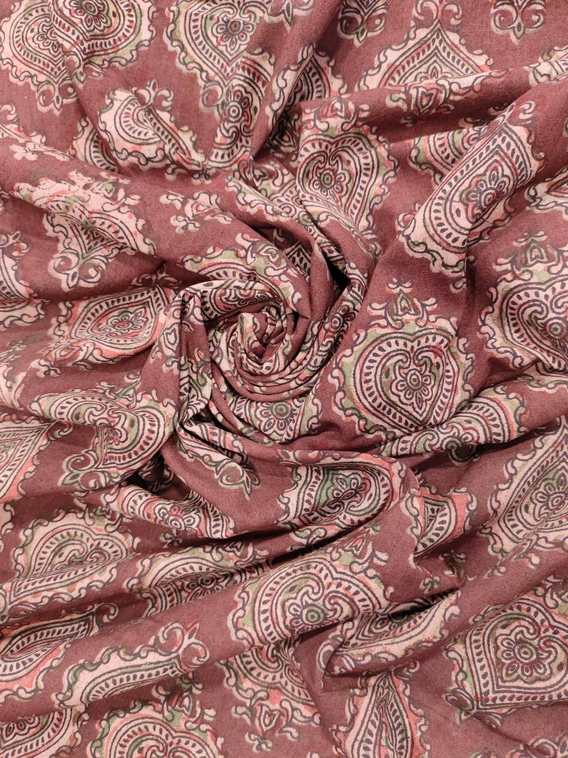 Maroon base ajrak print with black and green.