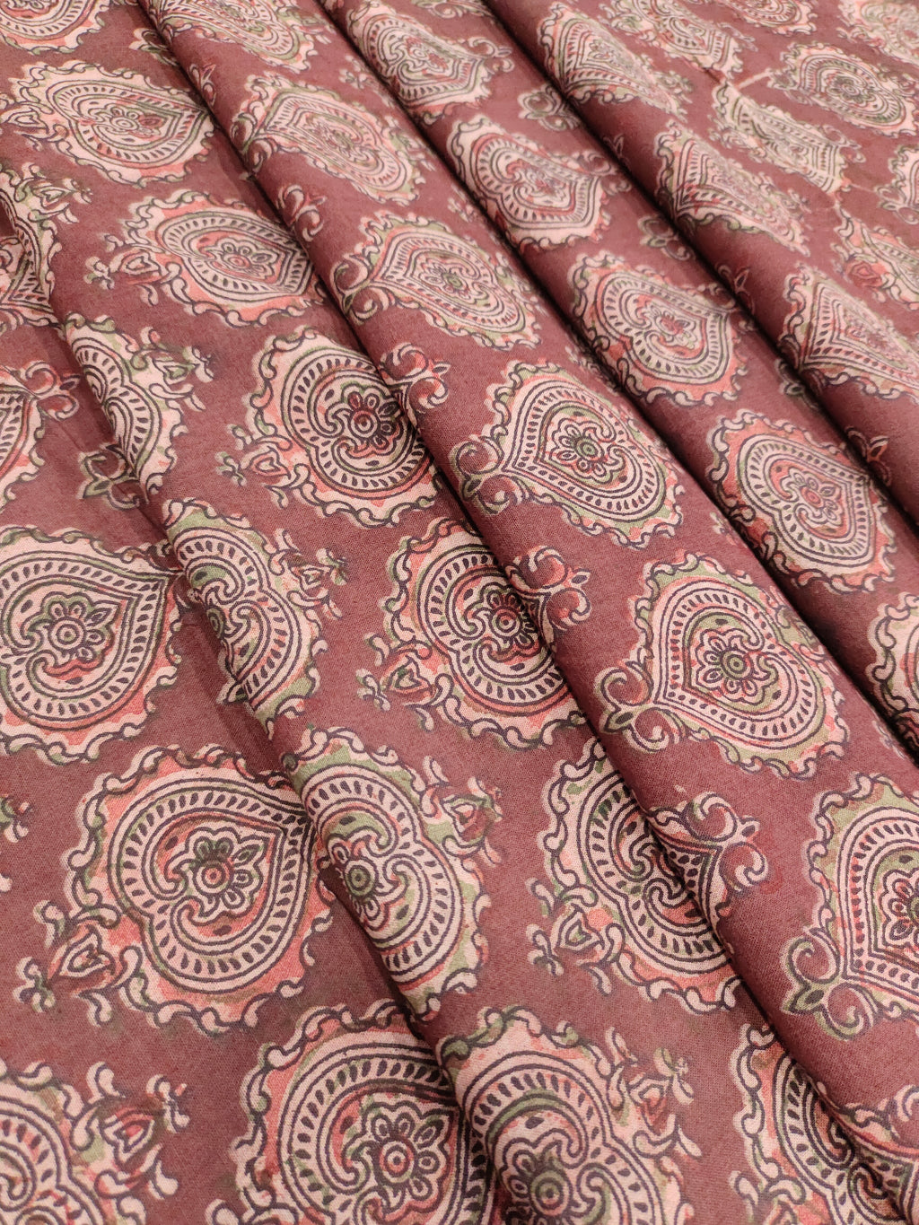 Maroon base ajrak print with black and green.