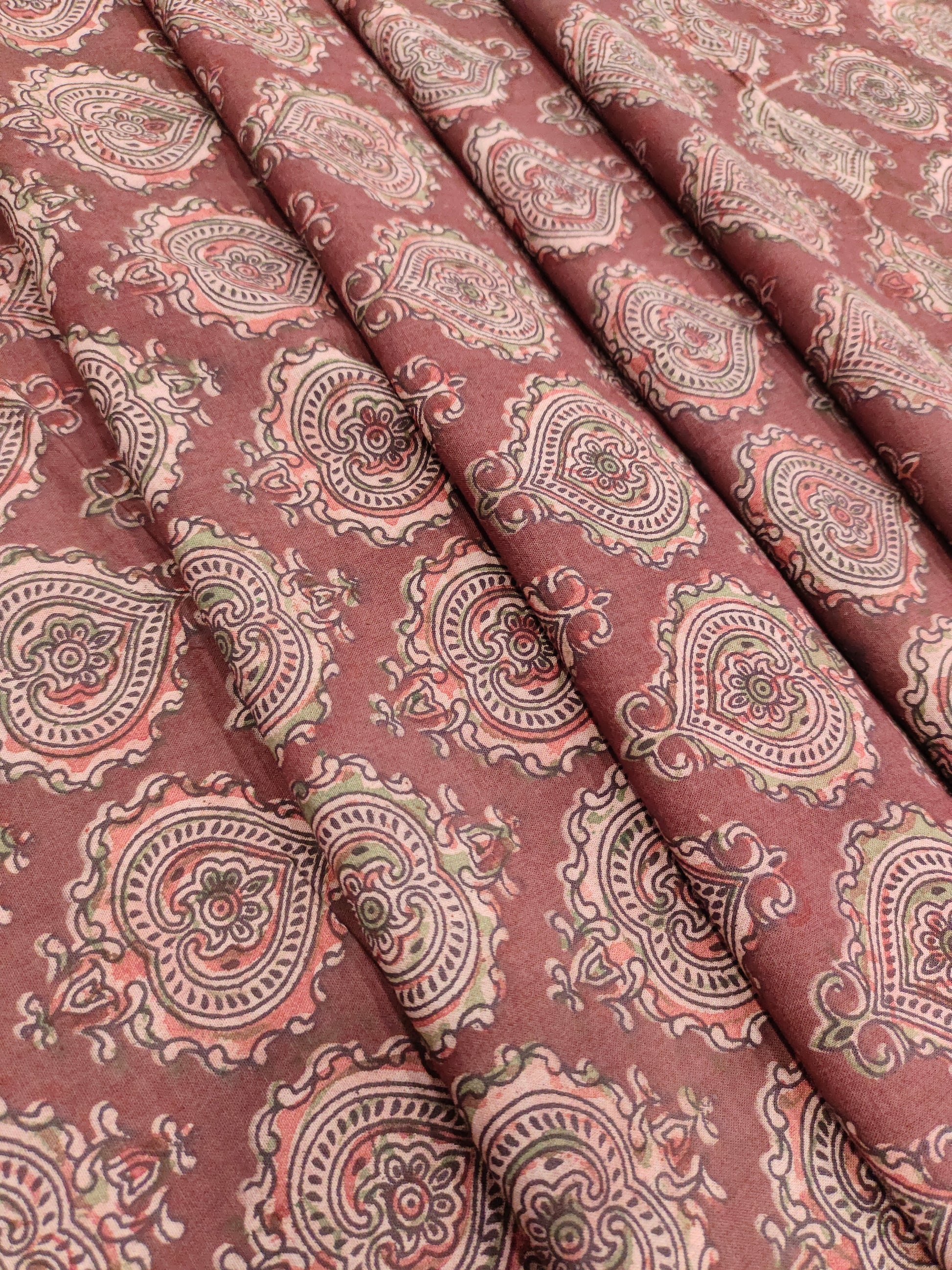 Maroon base ajrak print with black and green.