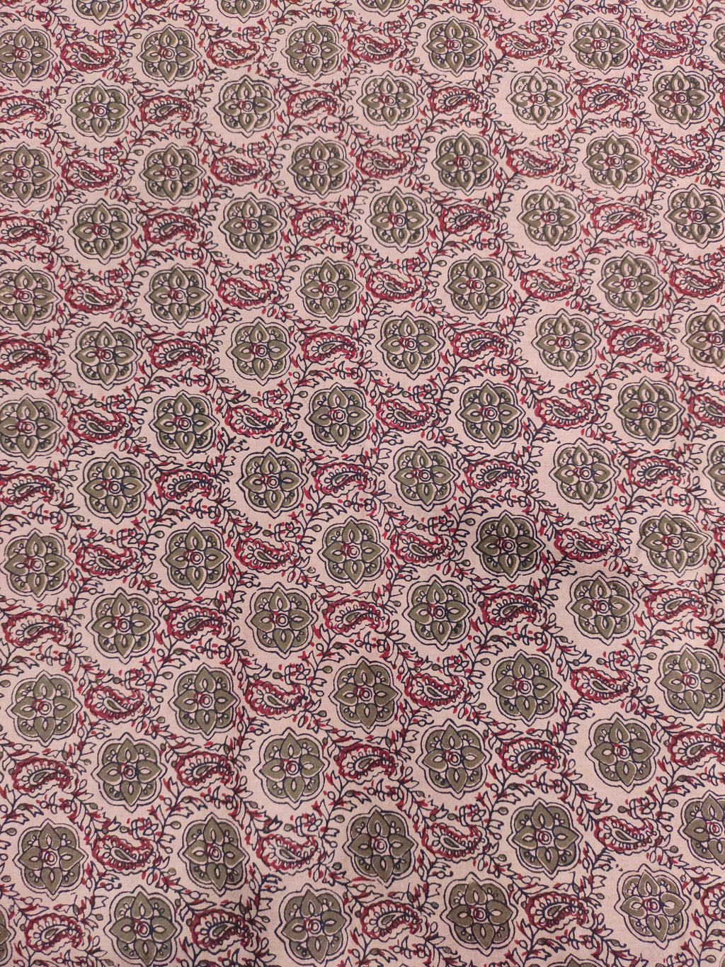 Cotton ajrak print on beige fabric with grey and maroon.