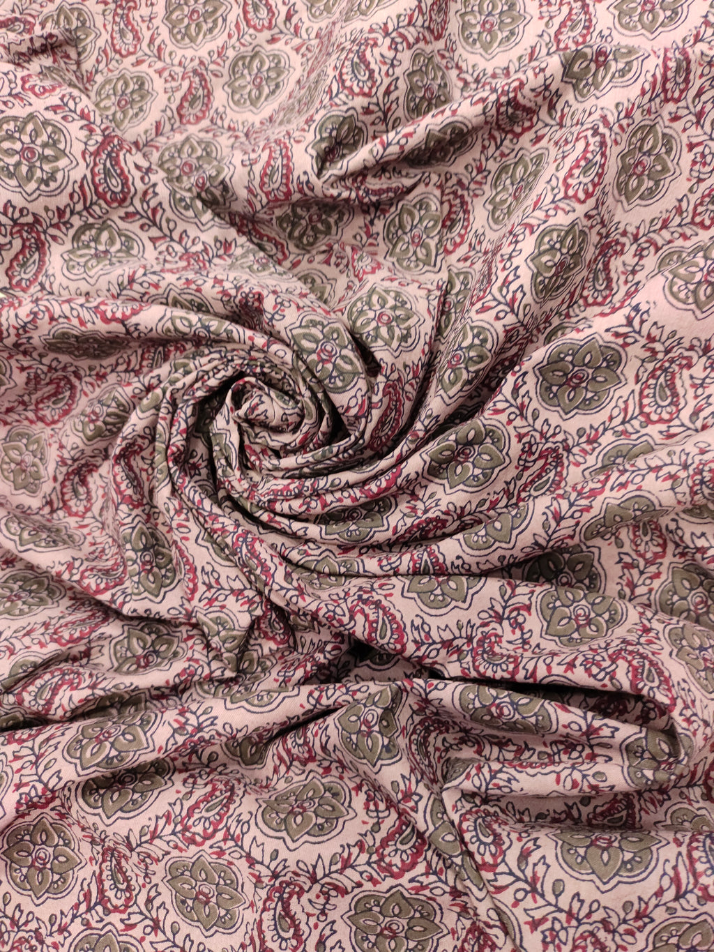 Cotton ajrak print on beige fabric with grey and maroon.