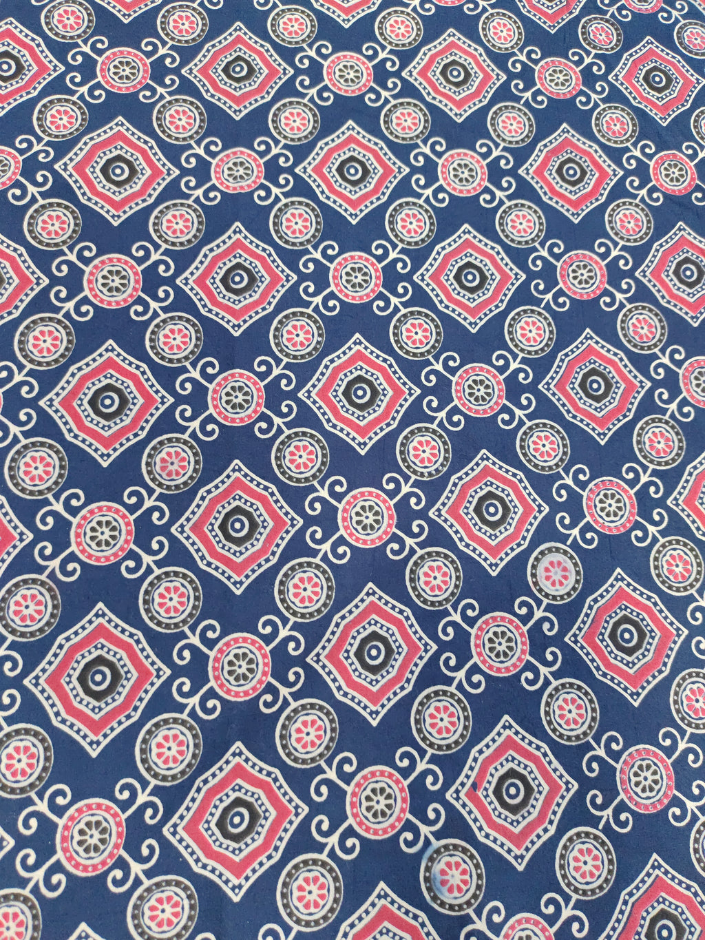 Blue ajrak print allover with red and white.