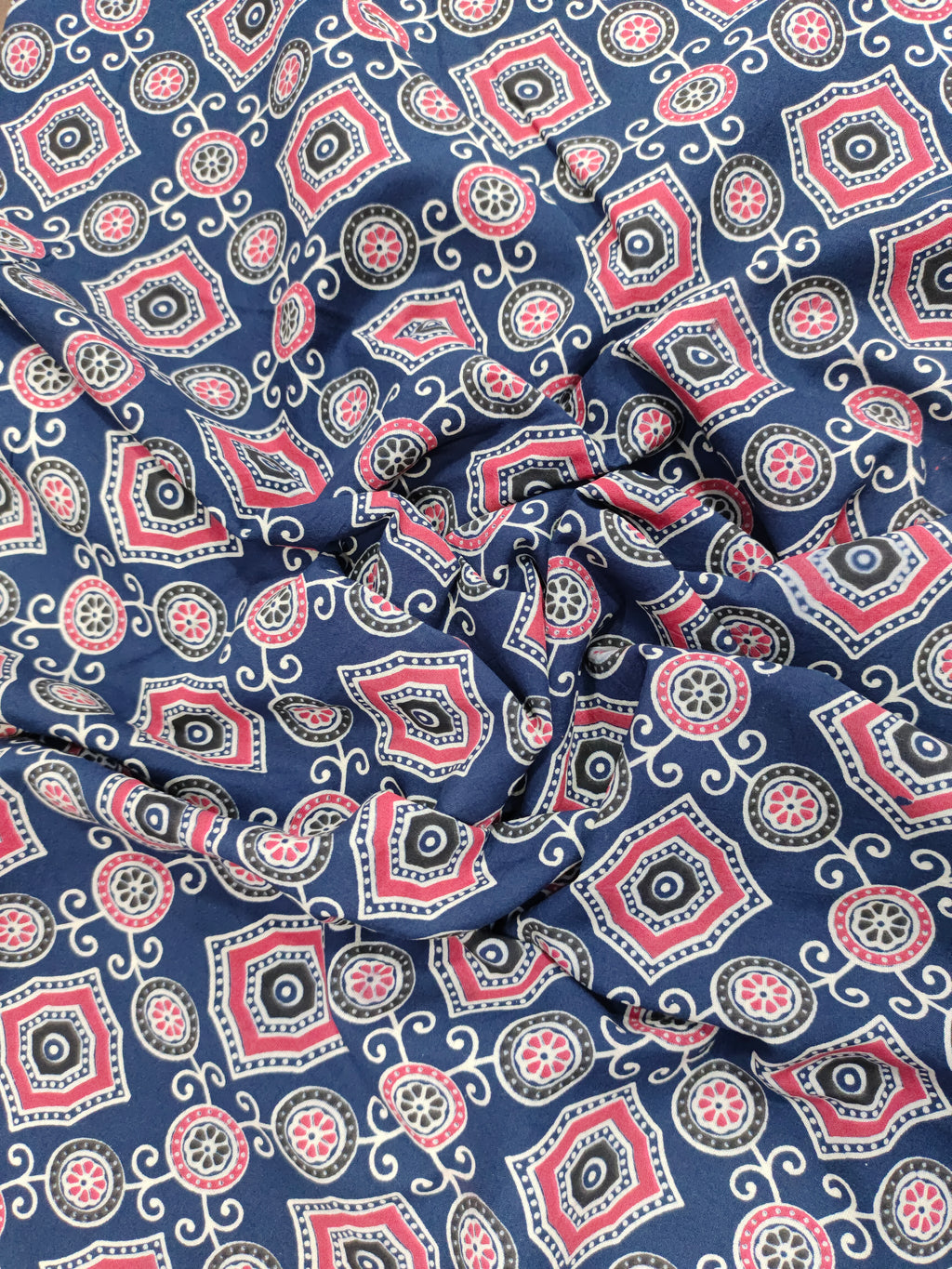 Blue ajrak print allover with red and white.