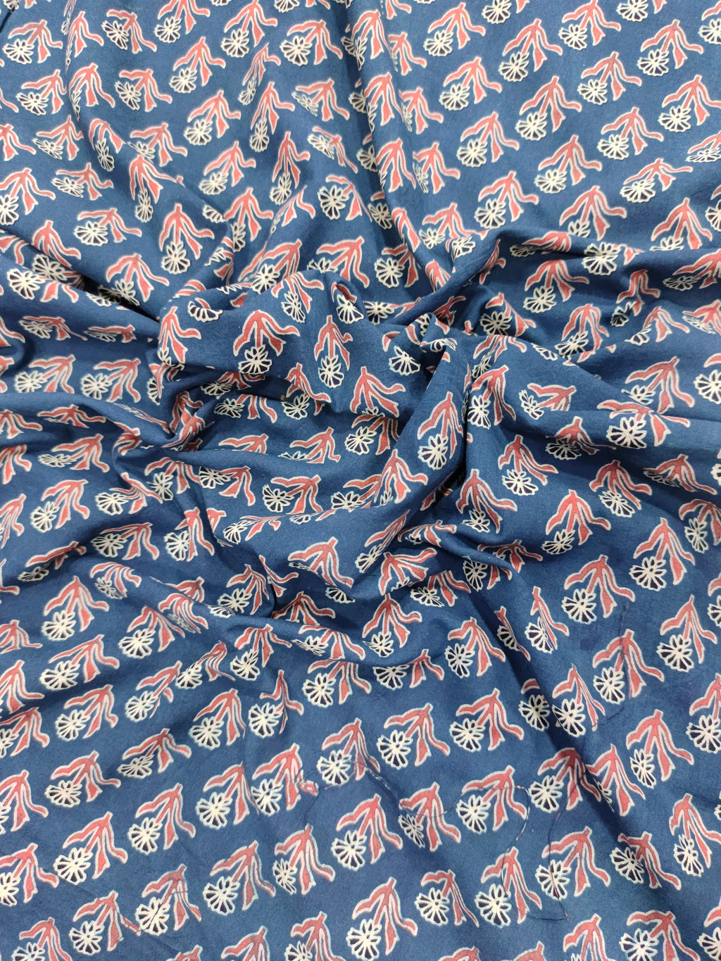 Blue base cotton fabric ajrak print with maroon and offwhite.