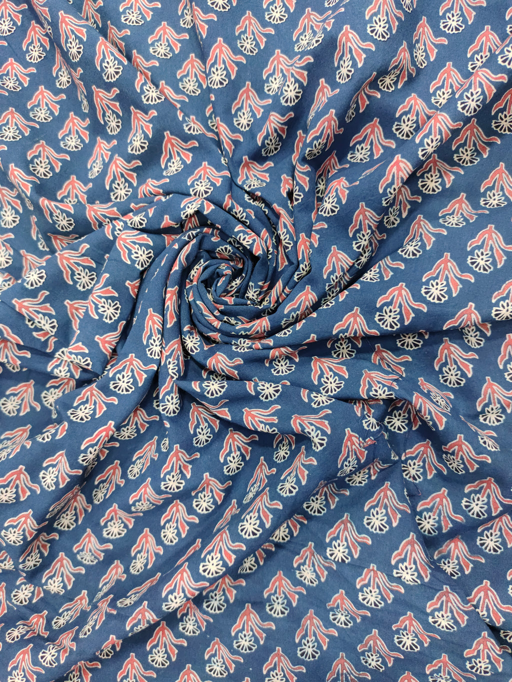 Blue base cotton fabric ajrak print with maroon and offwhite.