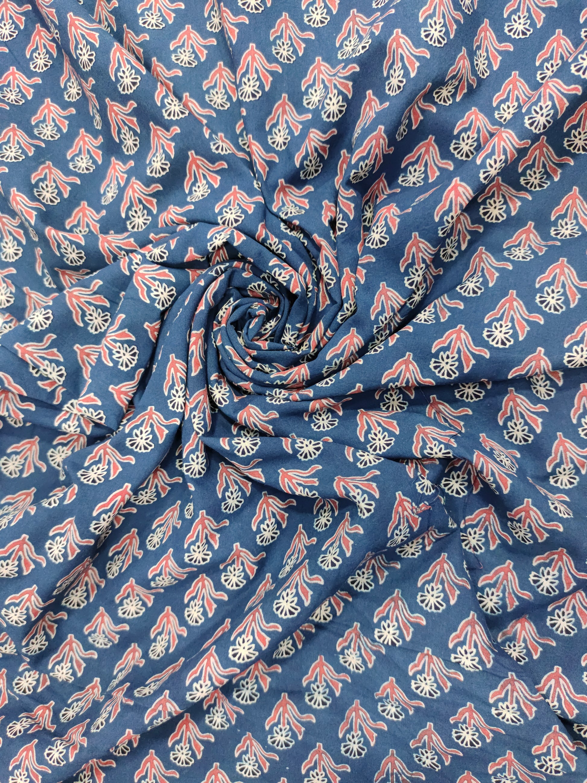 Blue base cotton fabric ajrak print with maroon and offwhite.