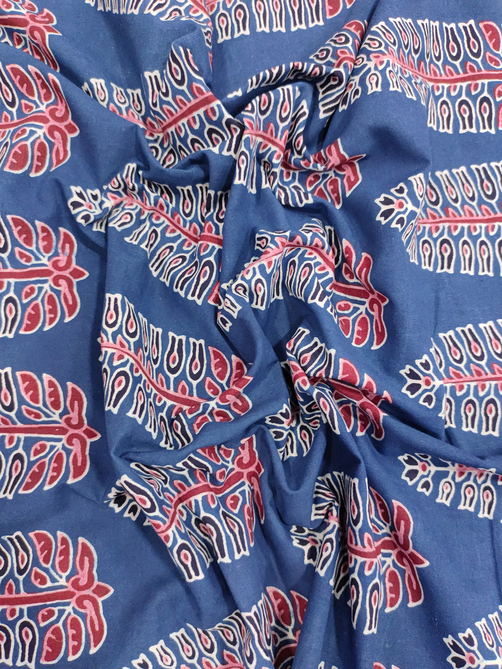 Ajrak print blue fabric with maroon traditional motif print.