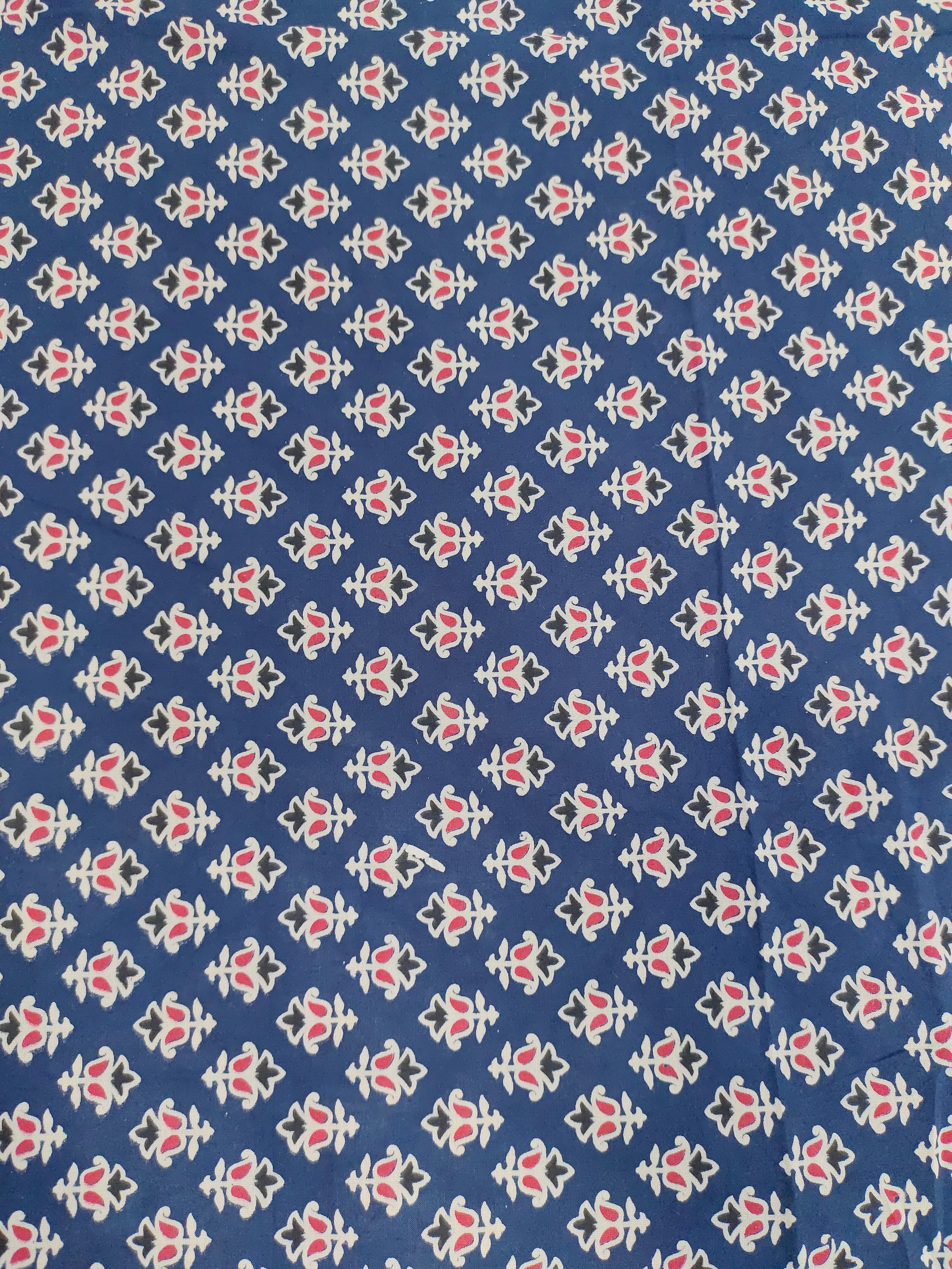 Blue cotton ajrak small butti with red and white.