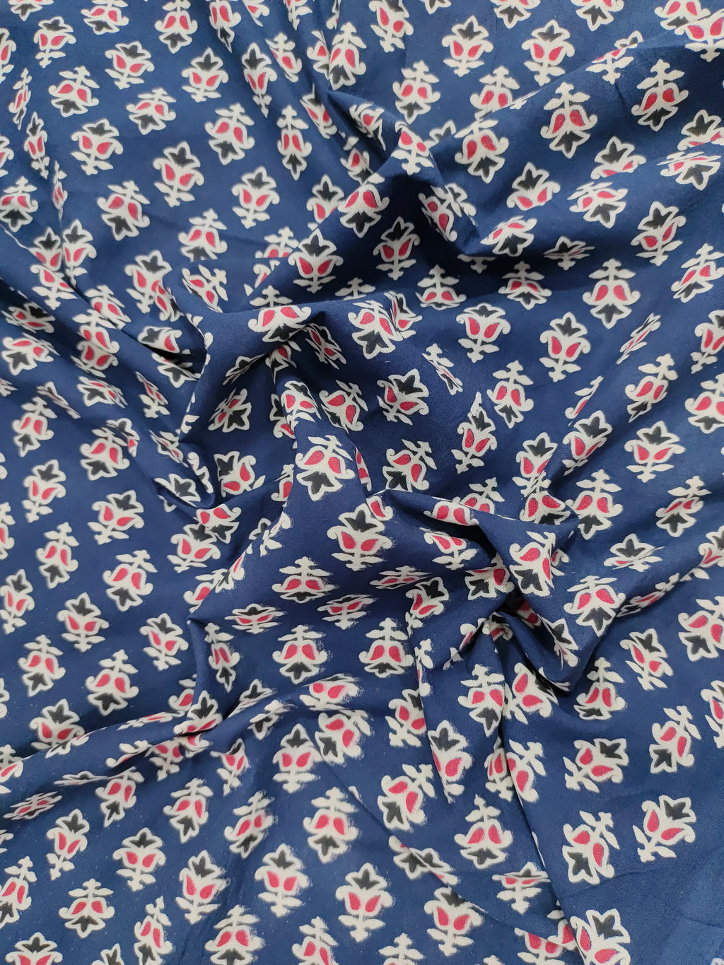 Blue cotton ajrak small butti with red and white.