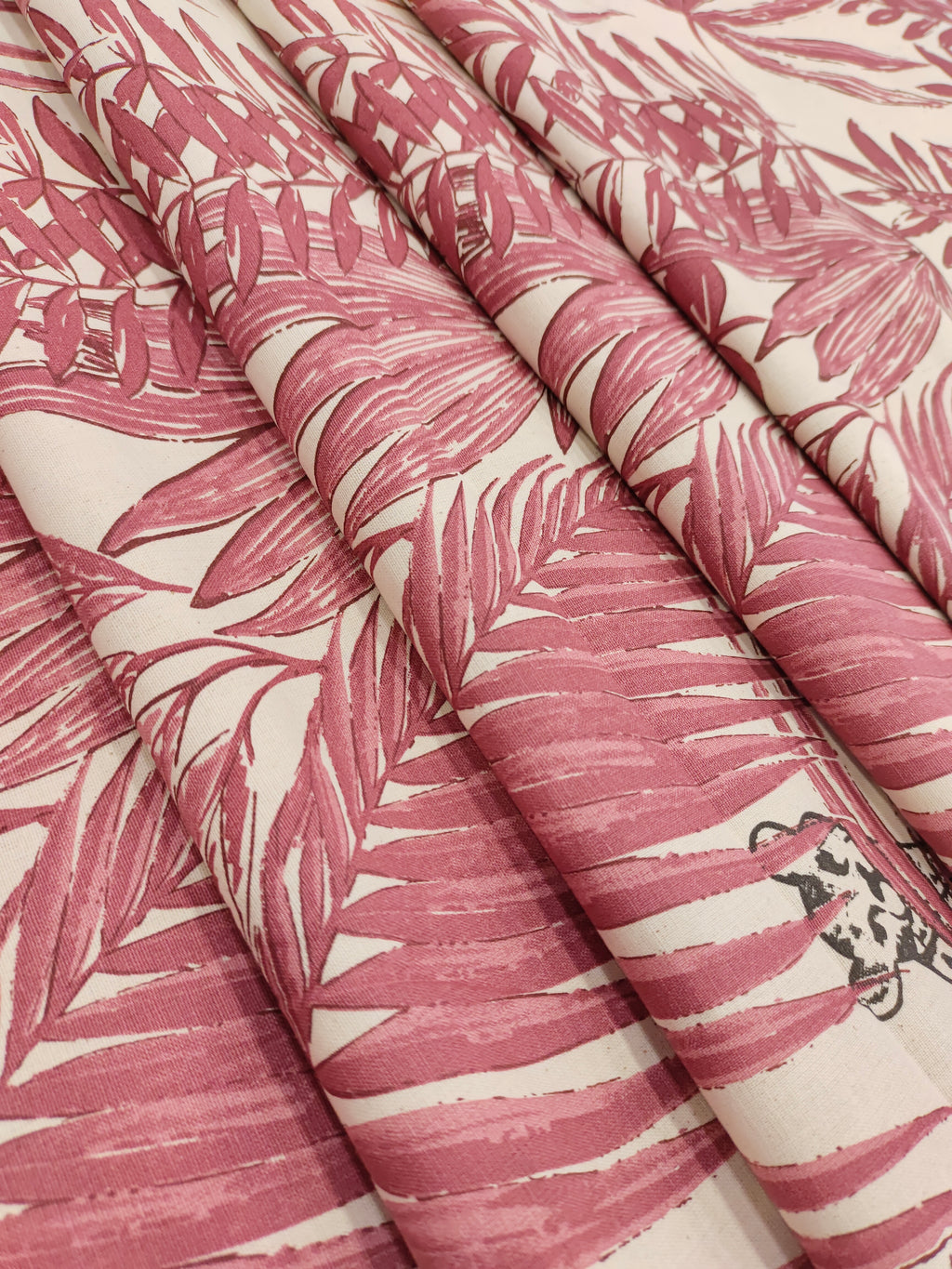 Light maroon cotton flex jungle print.