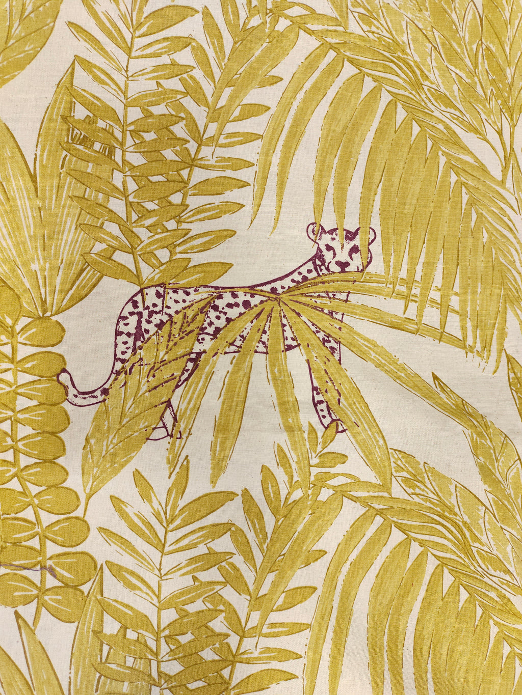 Flex cotton jungle print in mustard color.