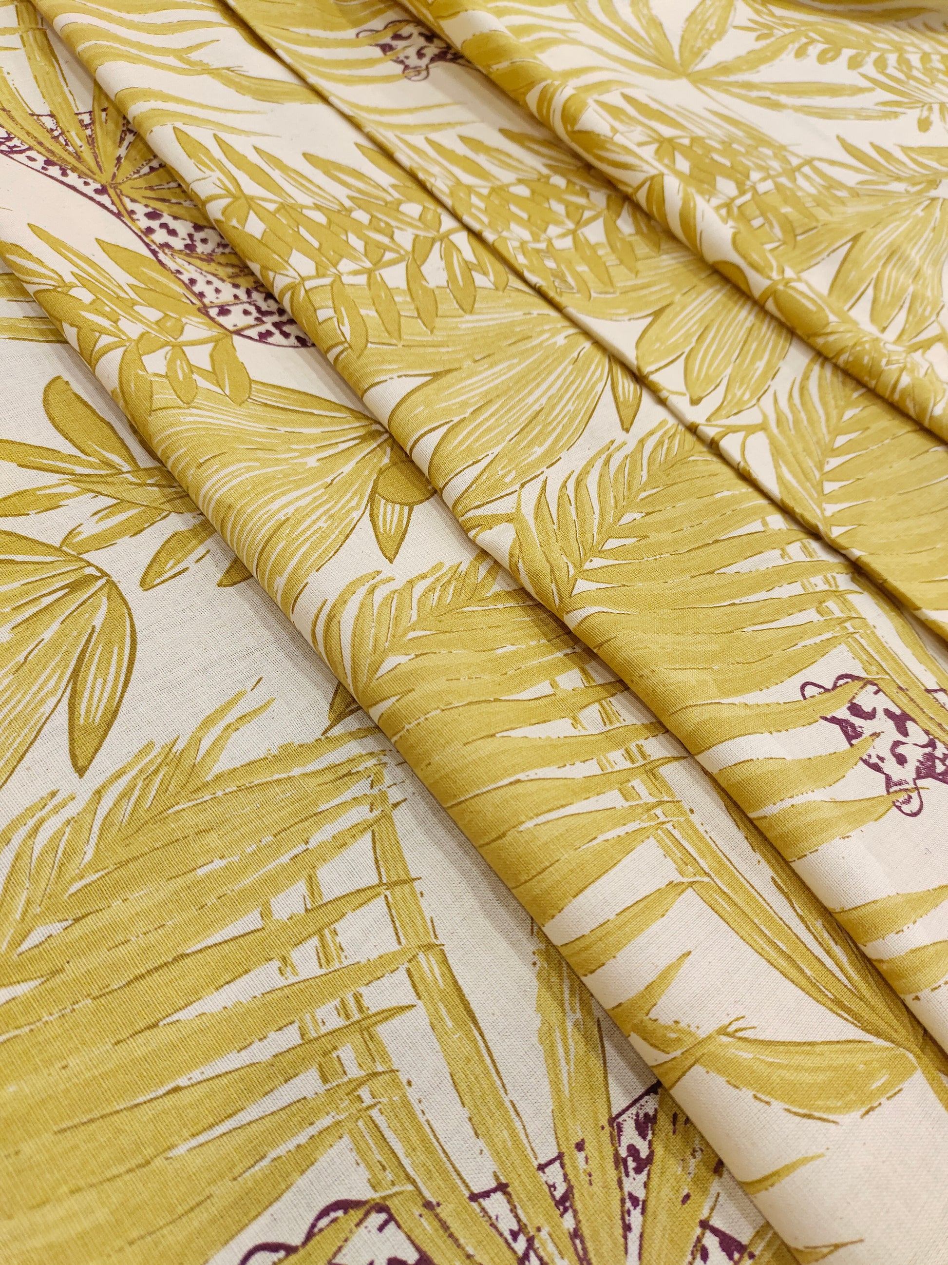 Flex cotton jungle print in mustard color.