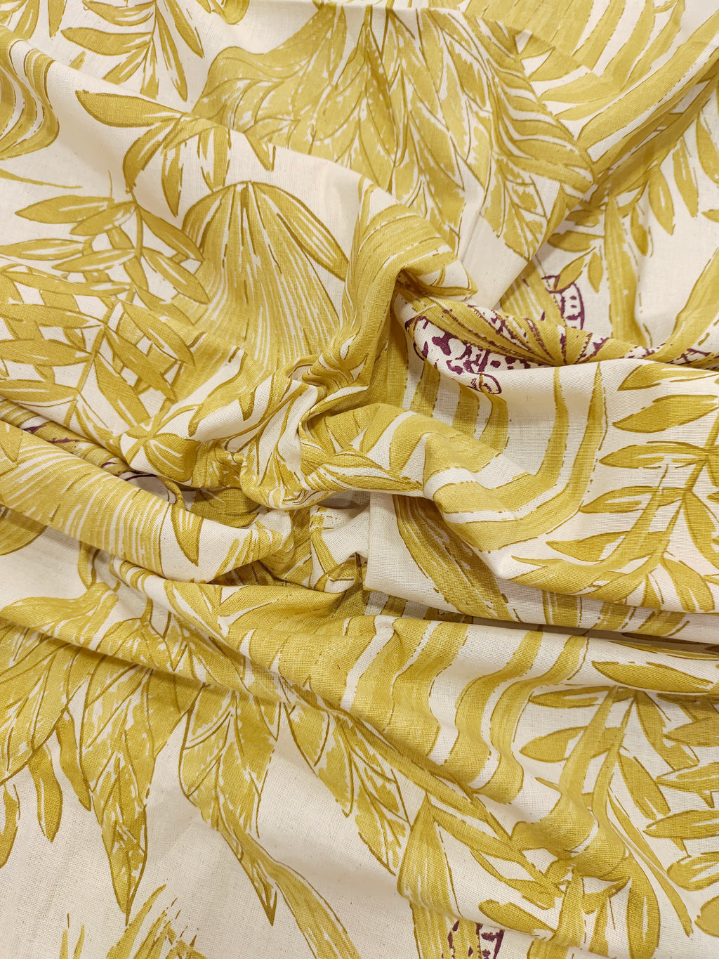 Flex cotton jungle print in mustard color.