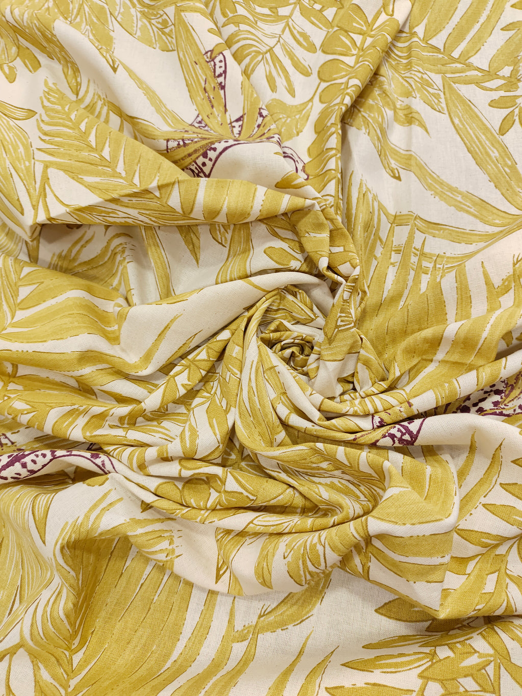 Flex cotton jungle print in mustard color.