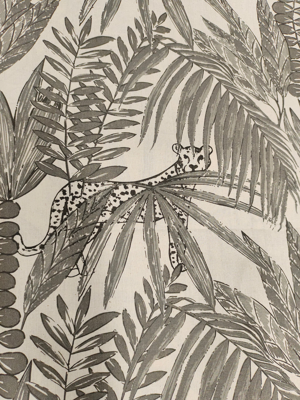 Cream flex cotton fabric jungle print with grey.