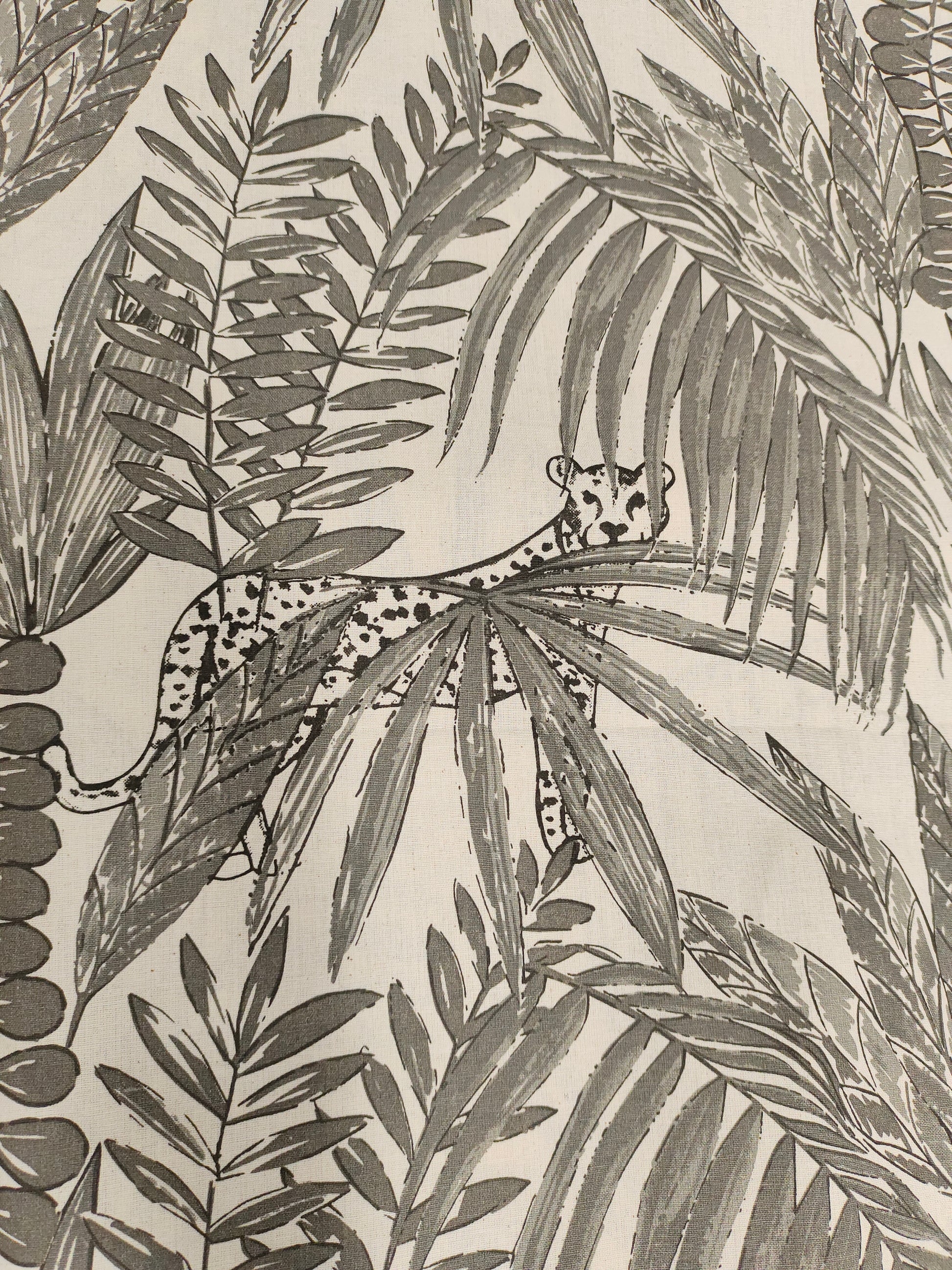 Cream flex cotton fabric jungle print with grey.