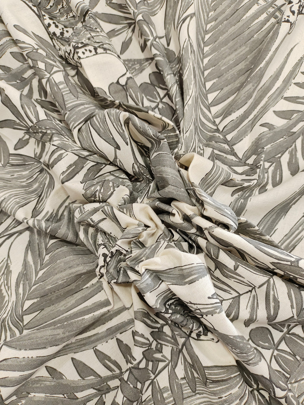Cream flex cotton fabric jungle print with grey.