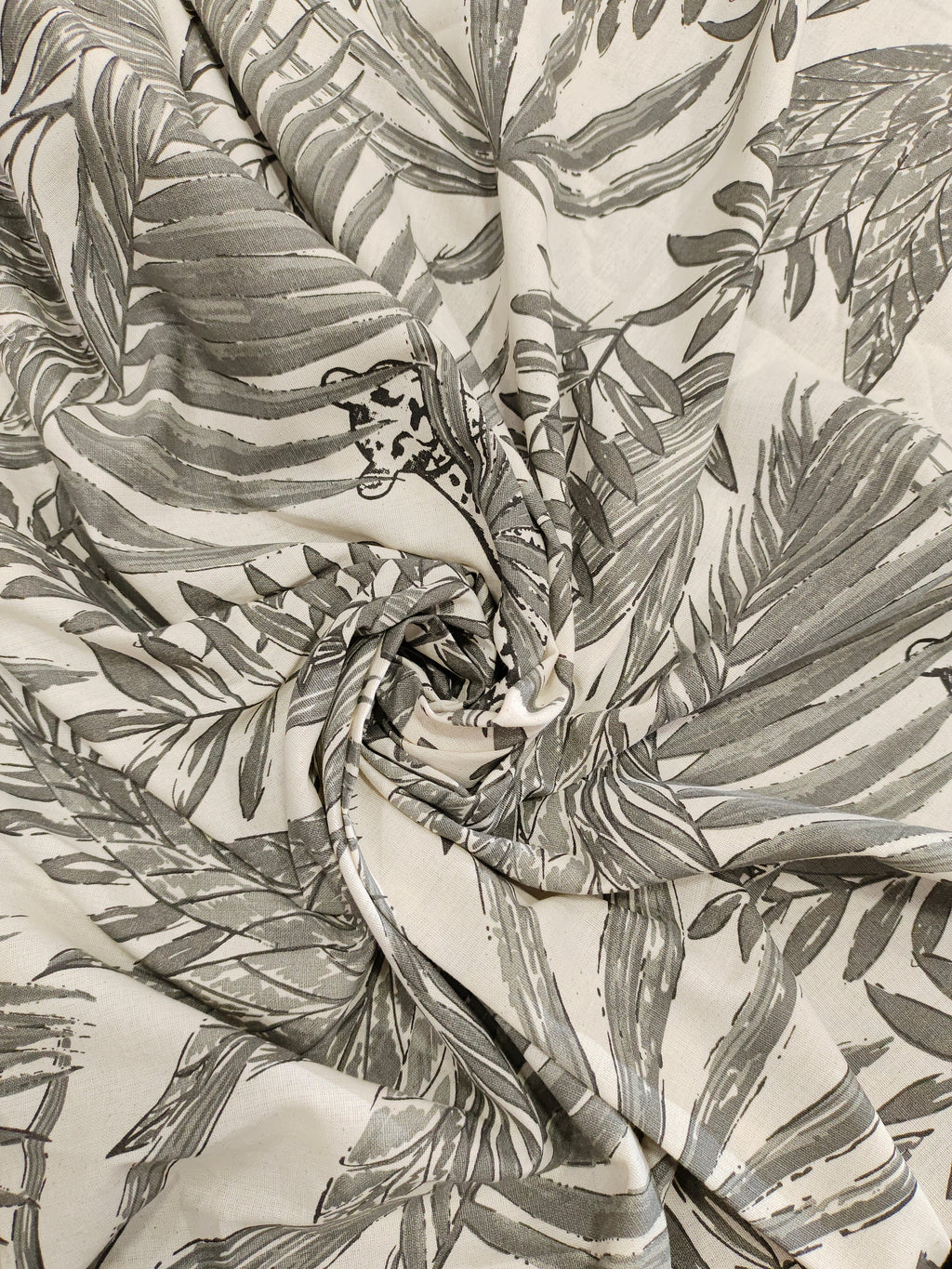 Cream flex cotton fabric jungle print with grey.