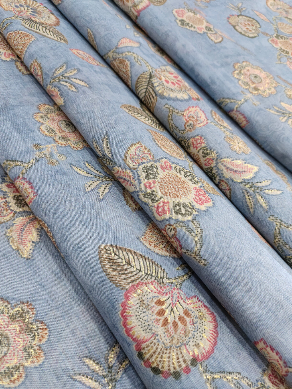 Excel Linen  digital print on grey fabric with pink beige and gold foile.