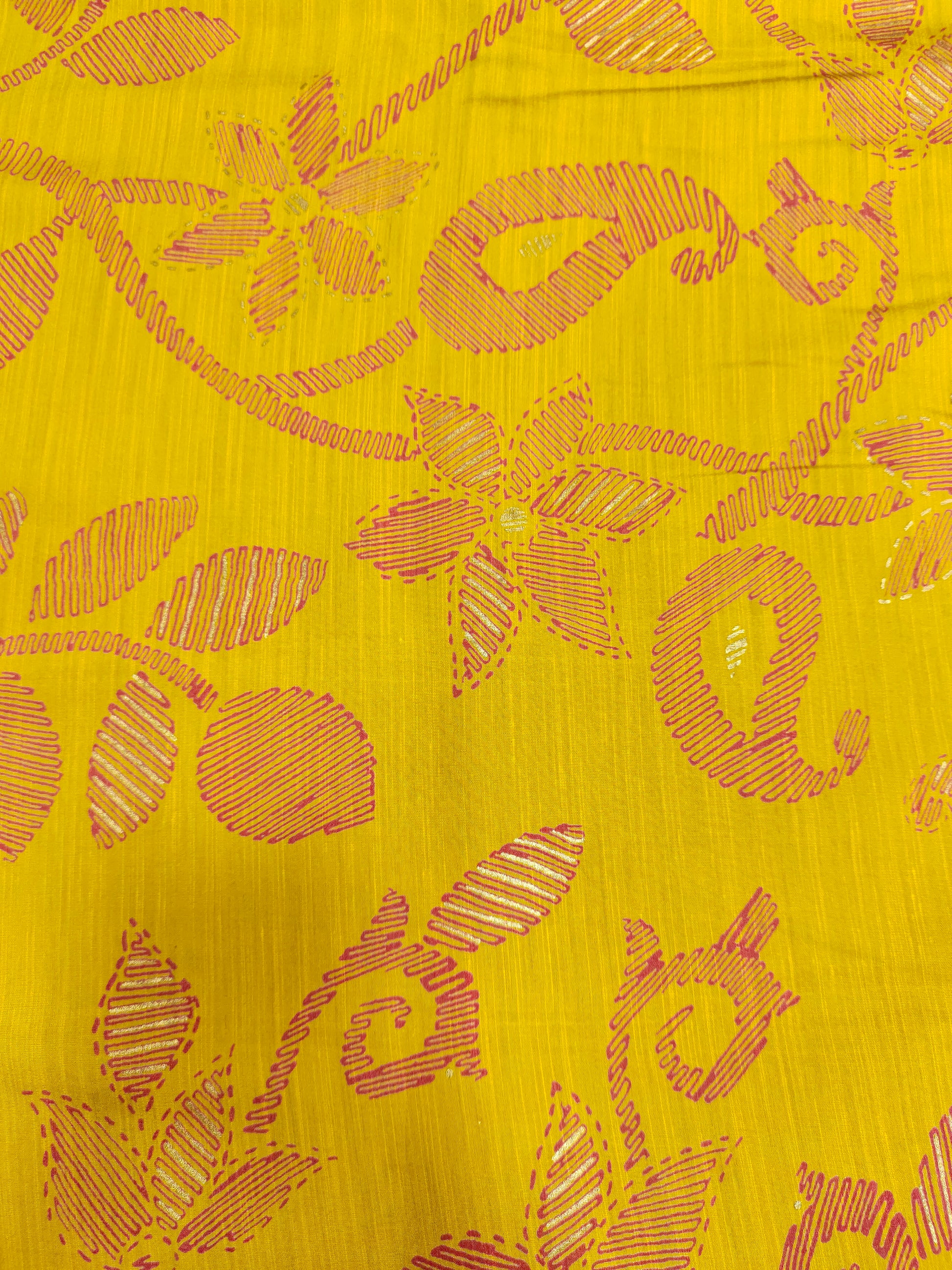 Avani silk discharge print with gold foile in mustard color.