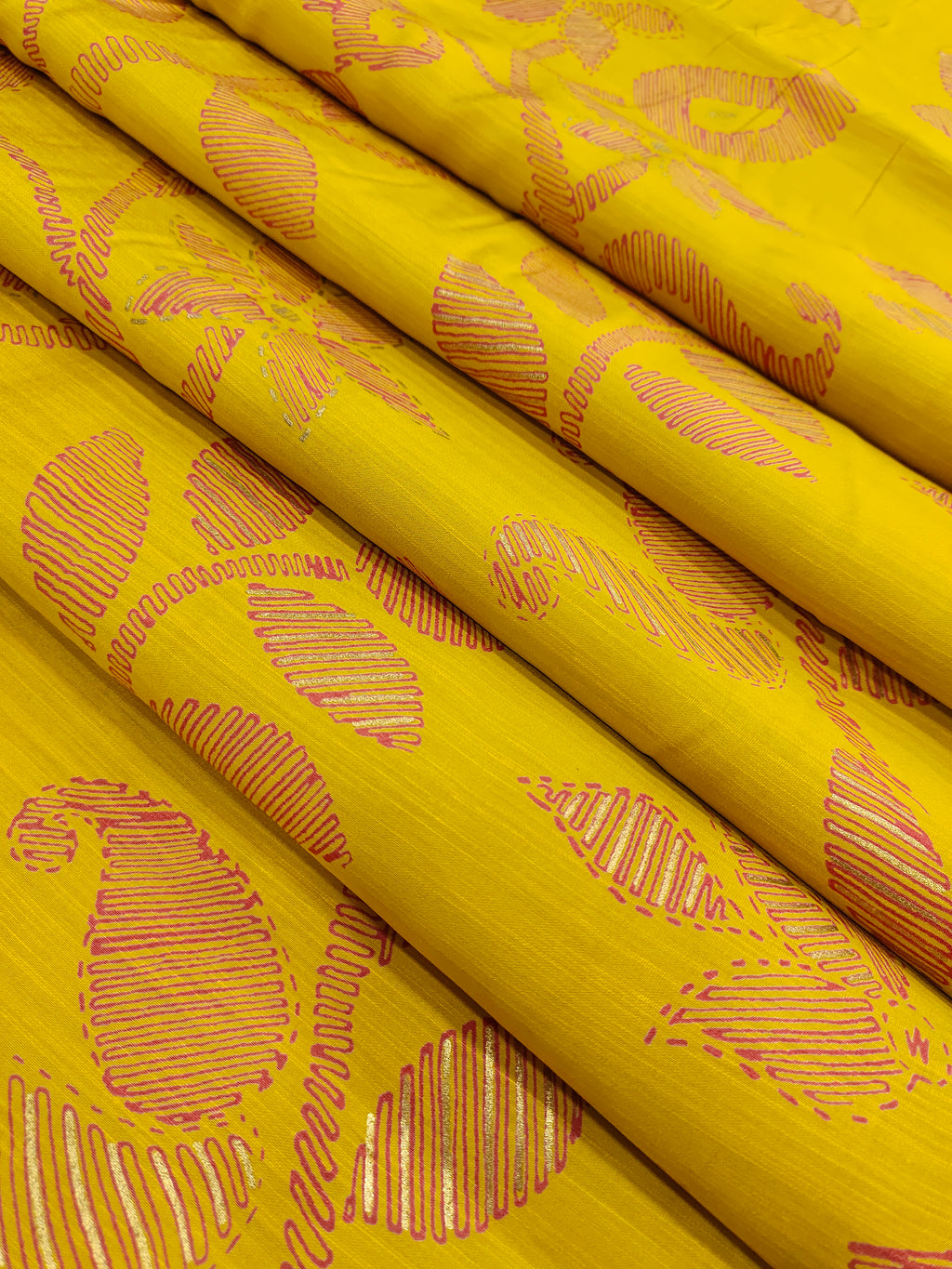 Avani silk discharge print with gold foile in mustard color.