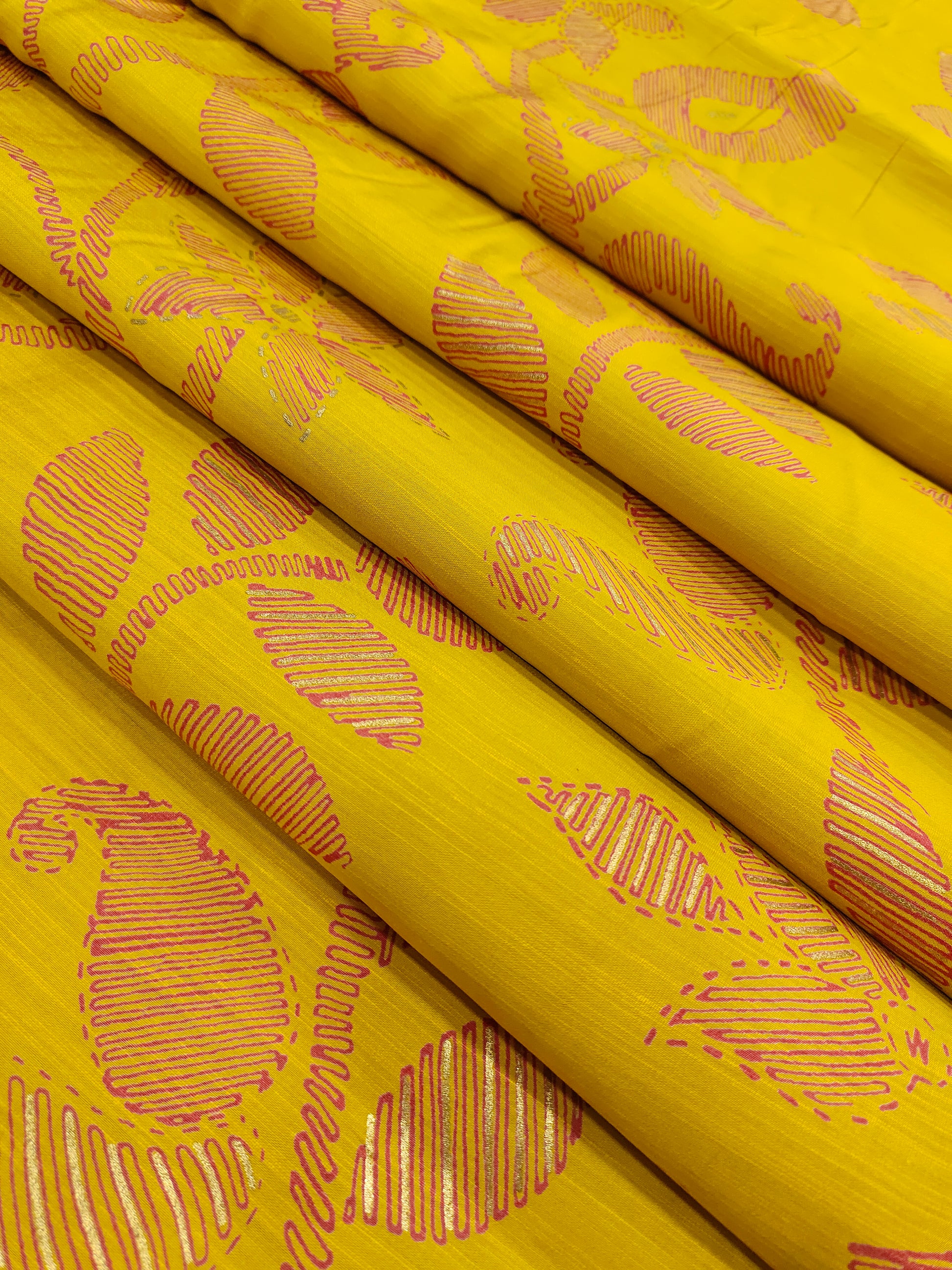 Avani silk discharge print with gold foile in mustard color.
