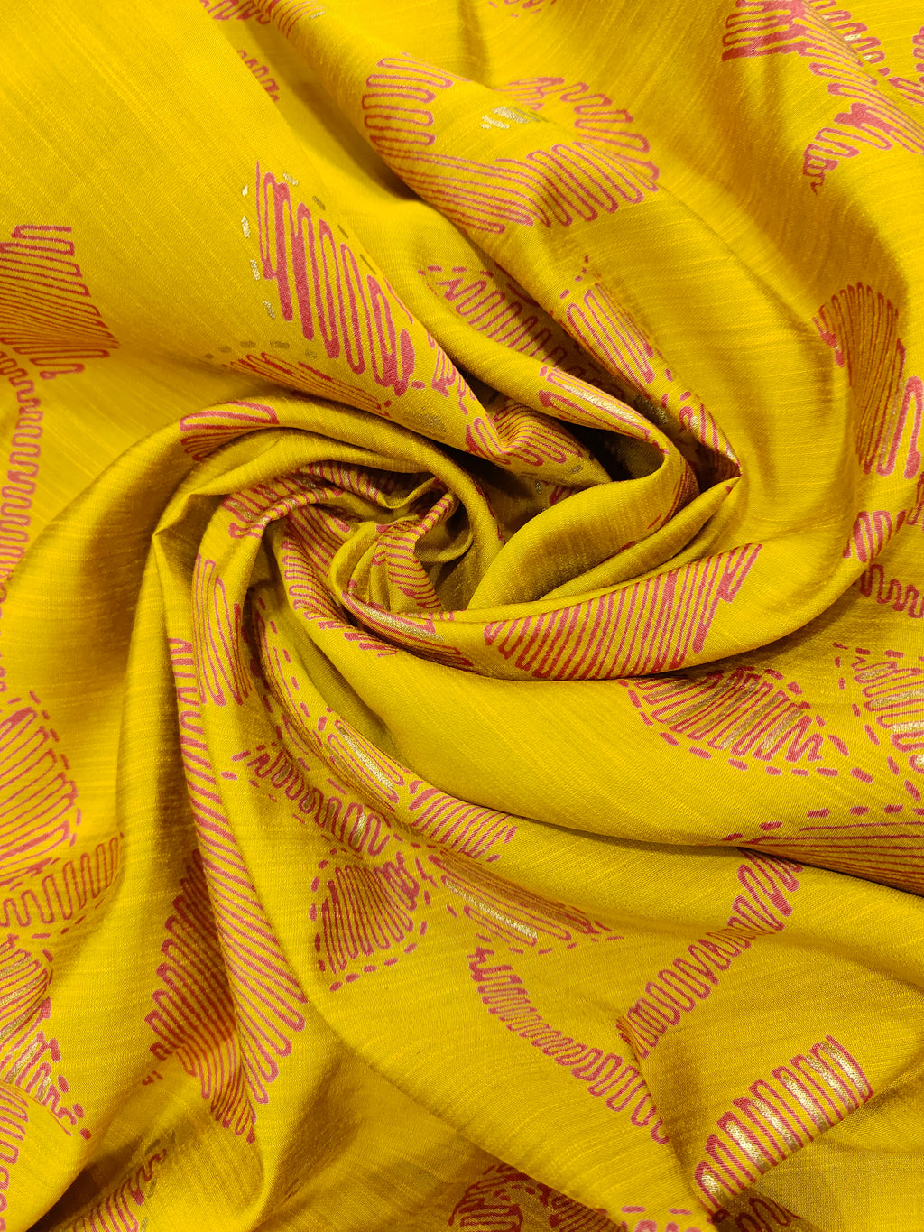 Avani silk discharge print with gold foile in mustard color.