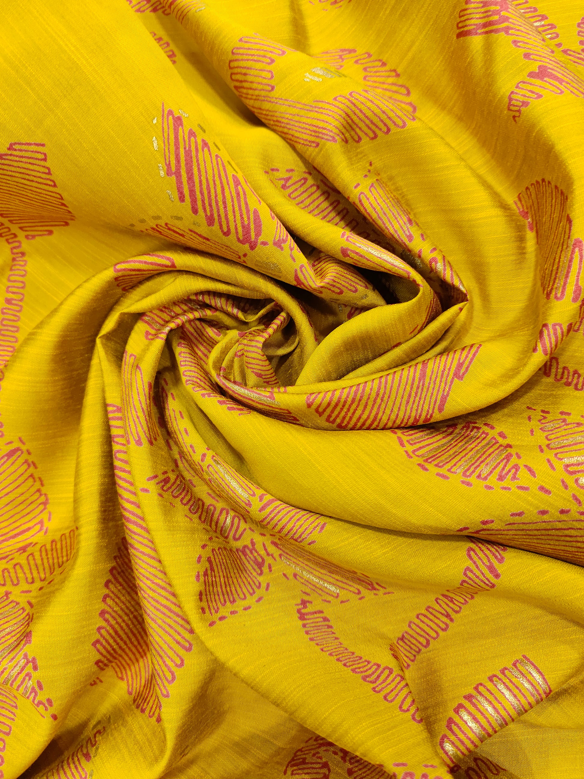 Avani silk discharge print with gold foile in mustard color.