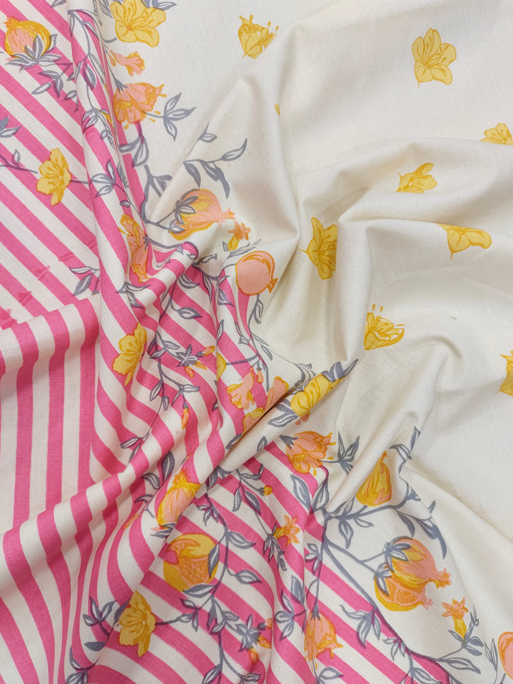 Cotton flex daman print with pink and yellow.
