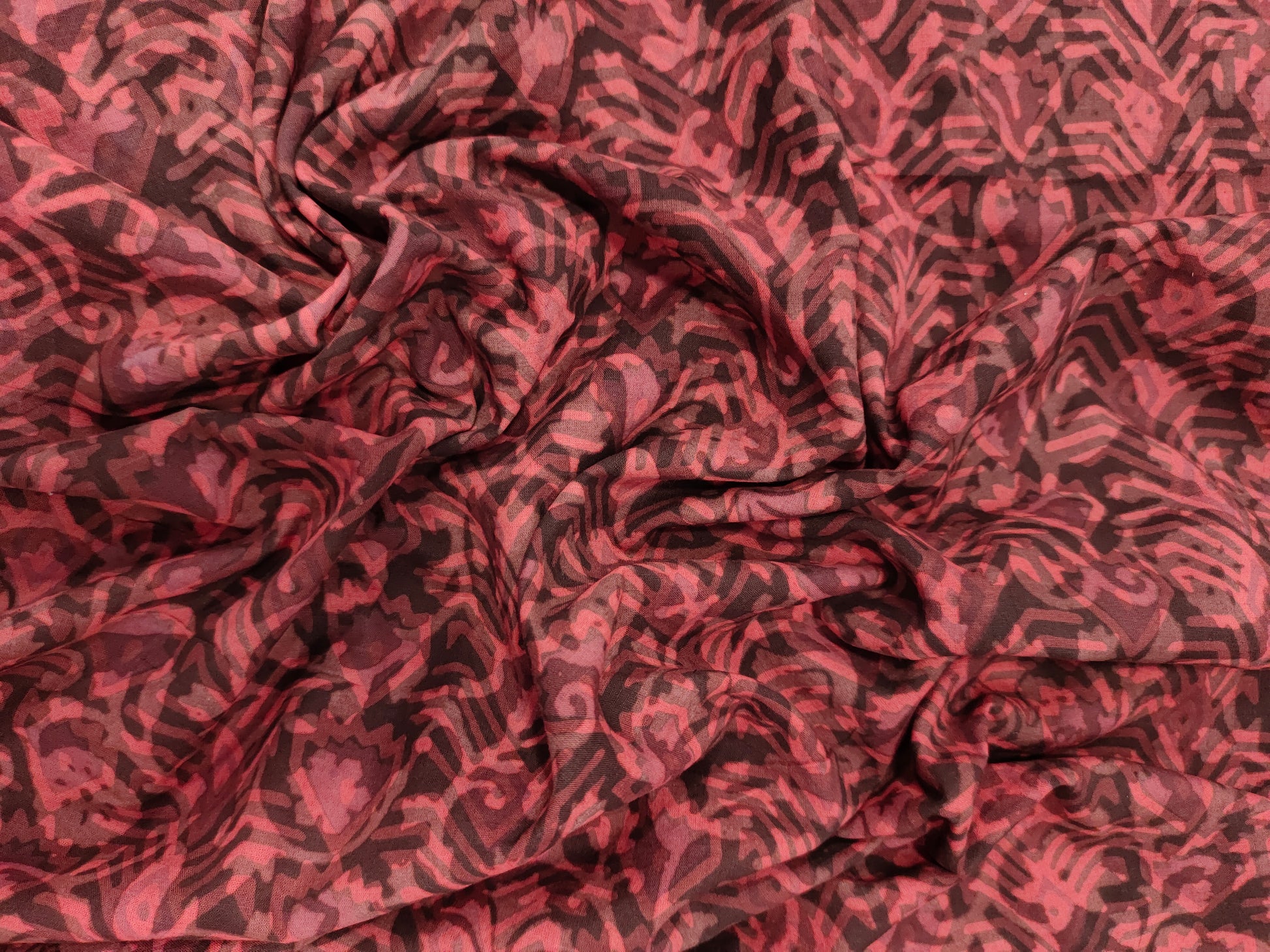 Cotton multi dabu hand block print in maroon color.