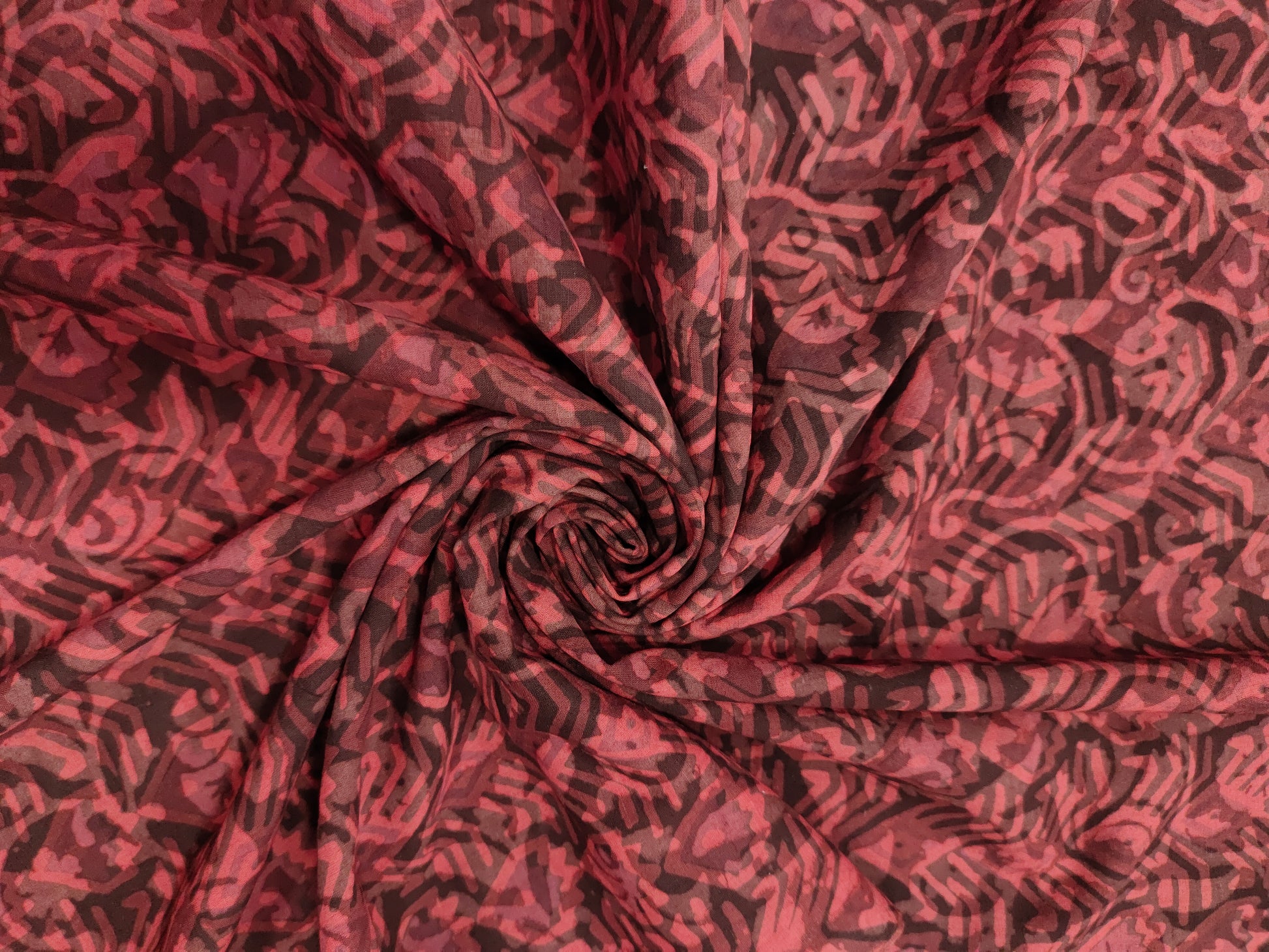 Cotton multi dabu hand block print in maroon color.