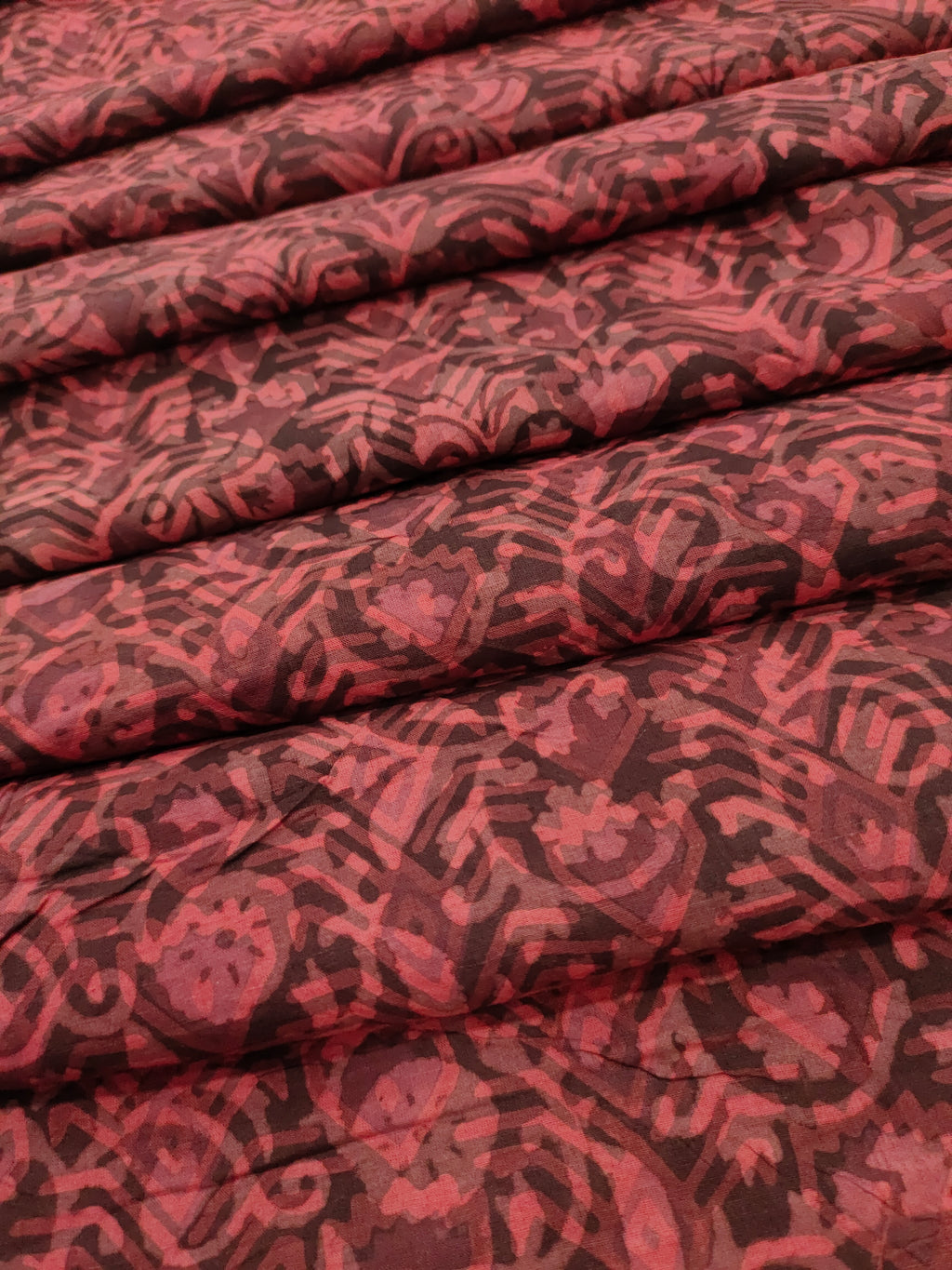 Cotton multi dabu hand block print in maroon color.