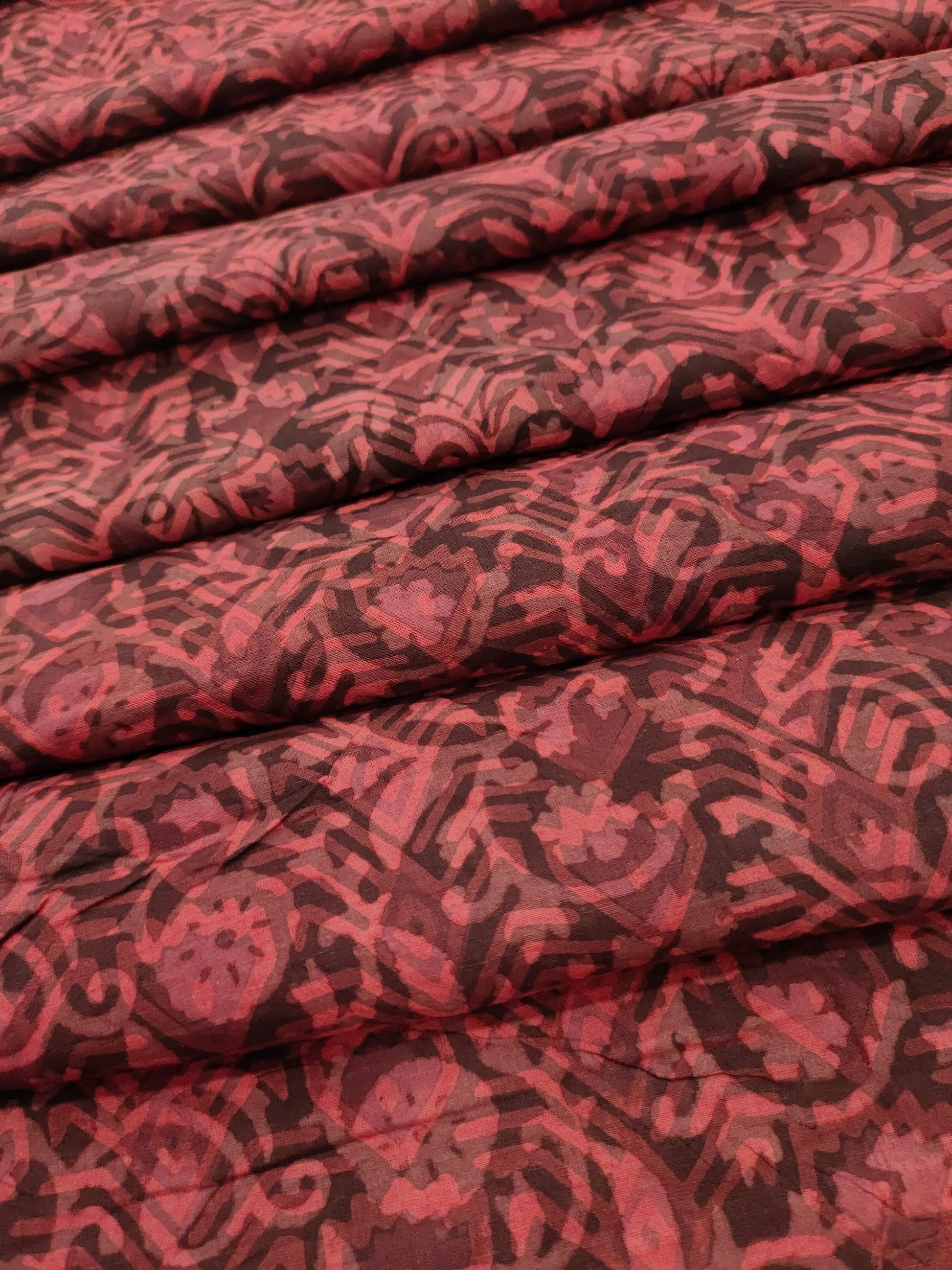 Cotton multi dabu hand block print in maroon color.