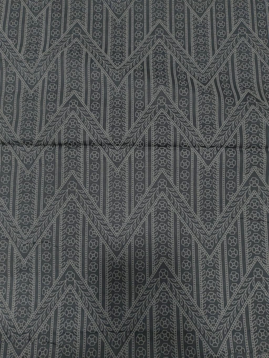 Black cotton fabric with grey stripes print.