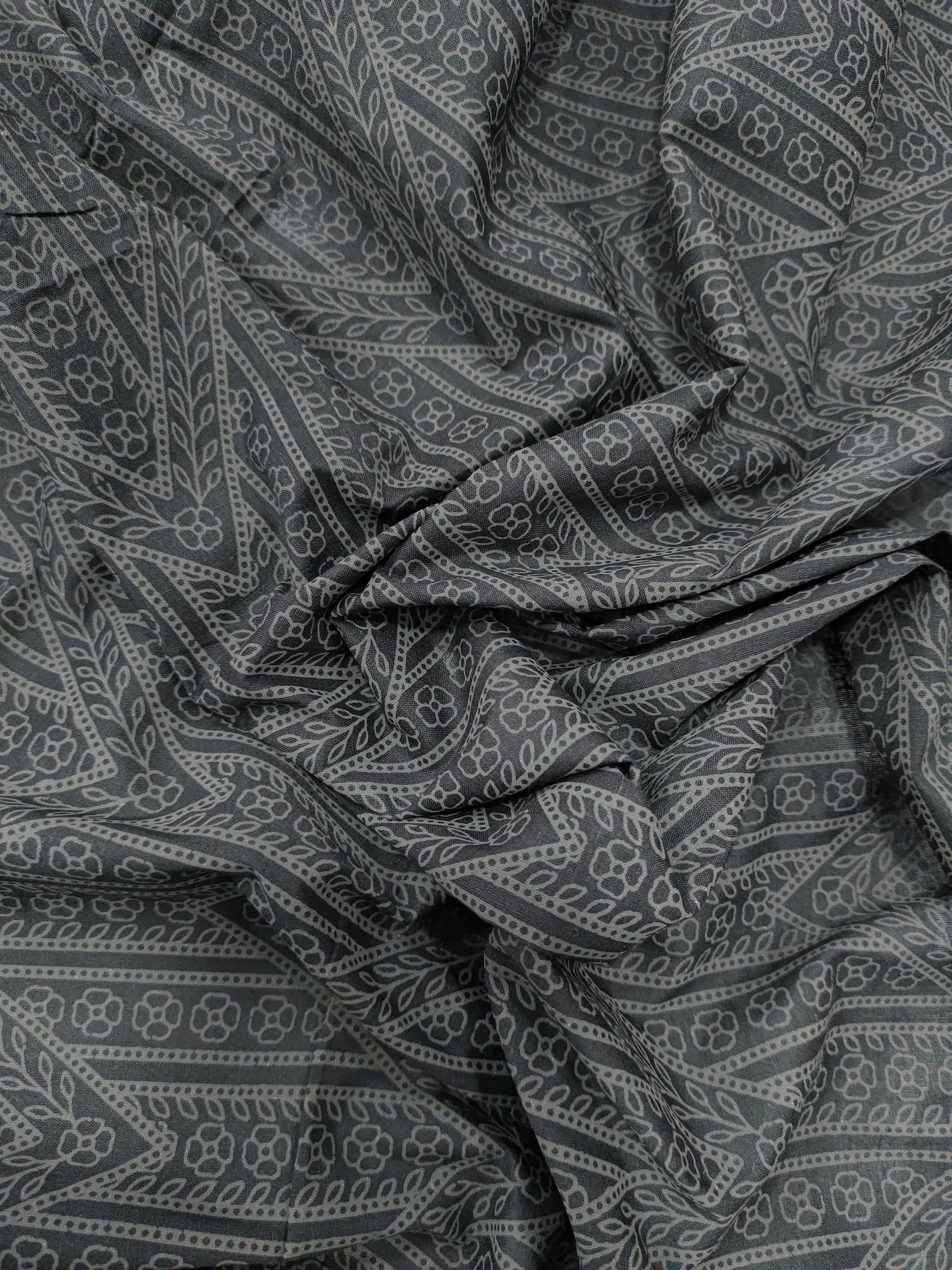 Black cotton fabric with grey stripes print.