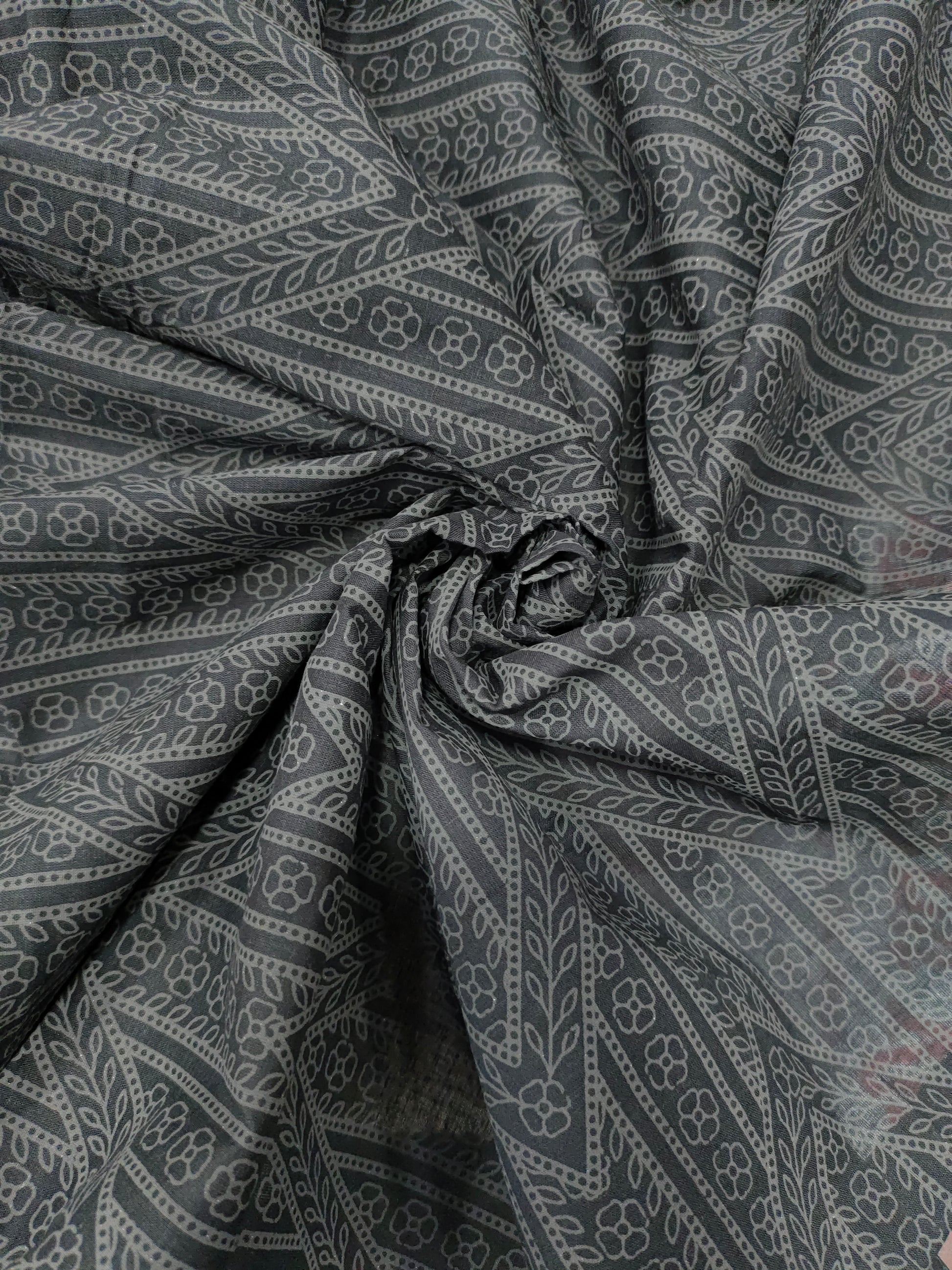 Black cotton fabric with grey stripes print.