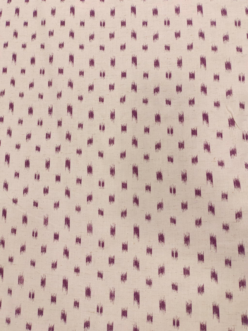 Cream cotton flex with mauve color ikkat print.