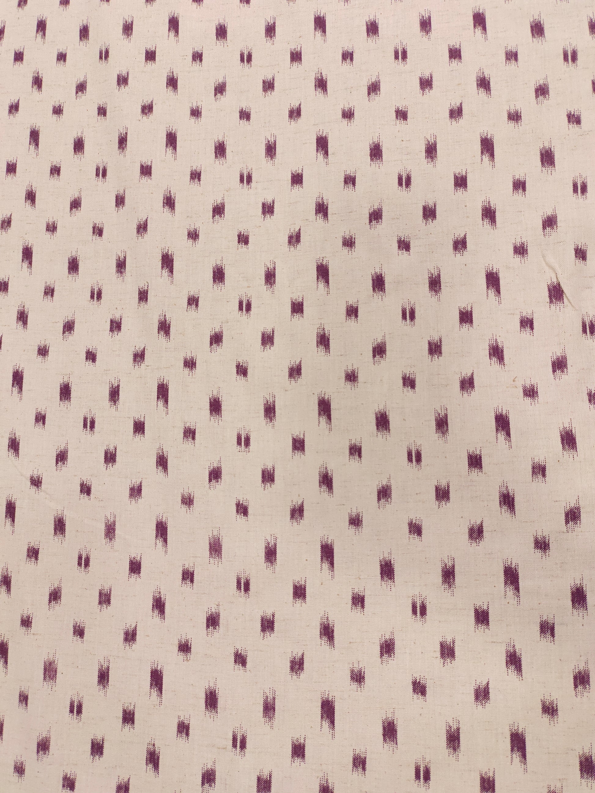 Cream cotton flex with mauve color ikkat print.