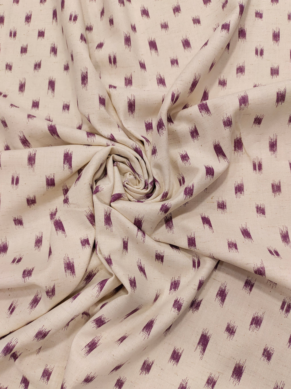 Cream cotton flex with mauve color ikkat print.