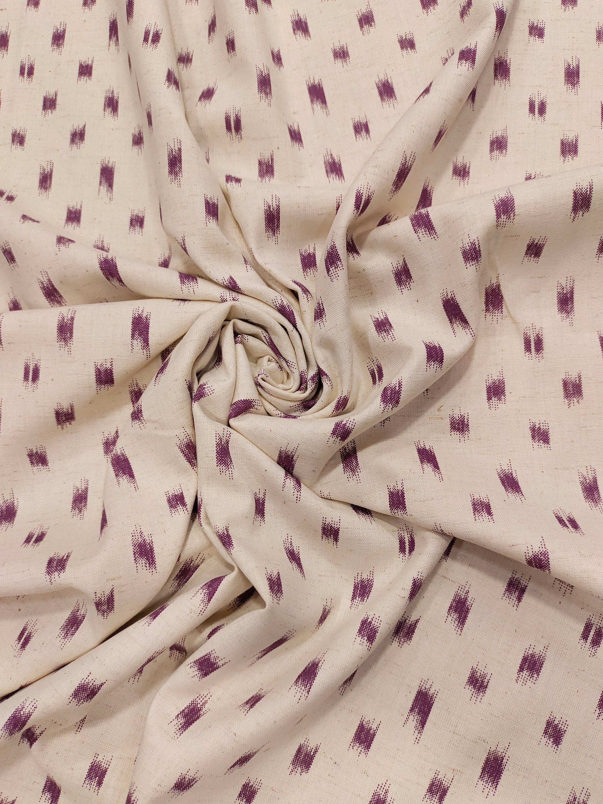 Cream cotton flex with mauve color ikkat print.