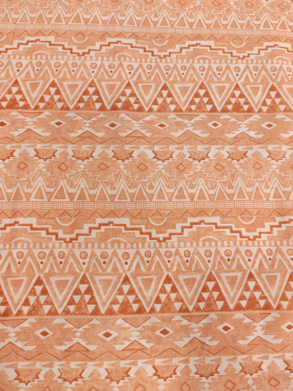 Cream fabric with broad peach stripes print.