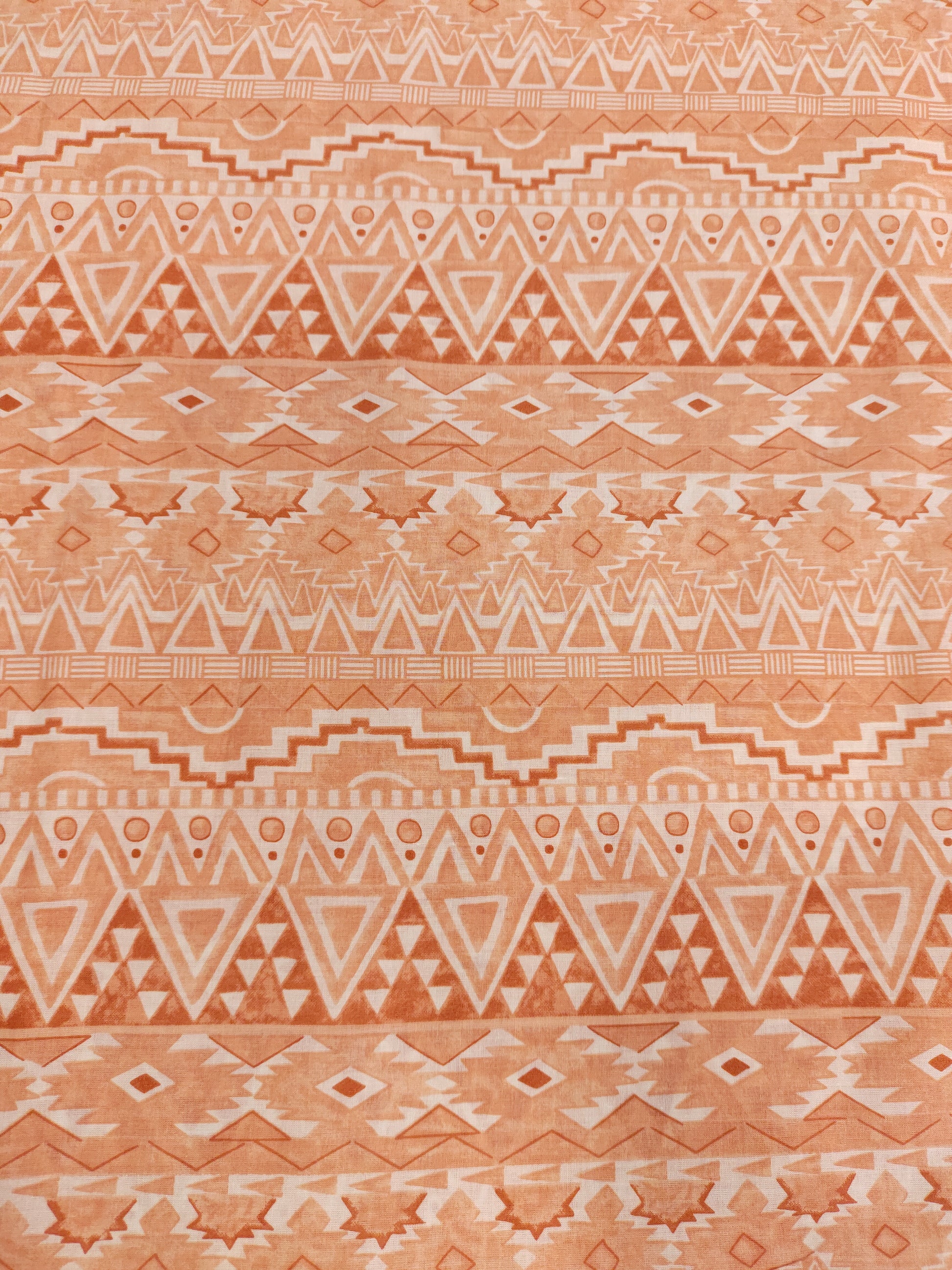 Cream fabric with broad peach stripes print.