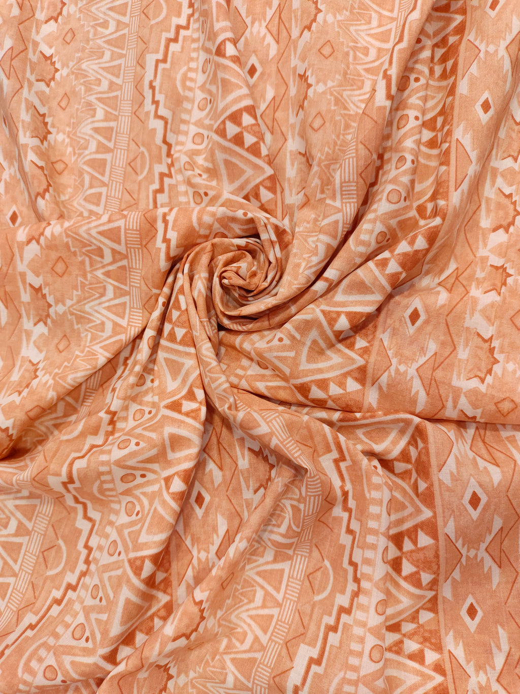 Cream fabric with broad peach stripes print.