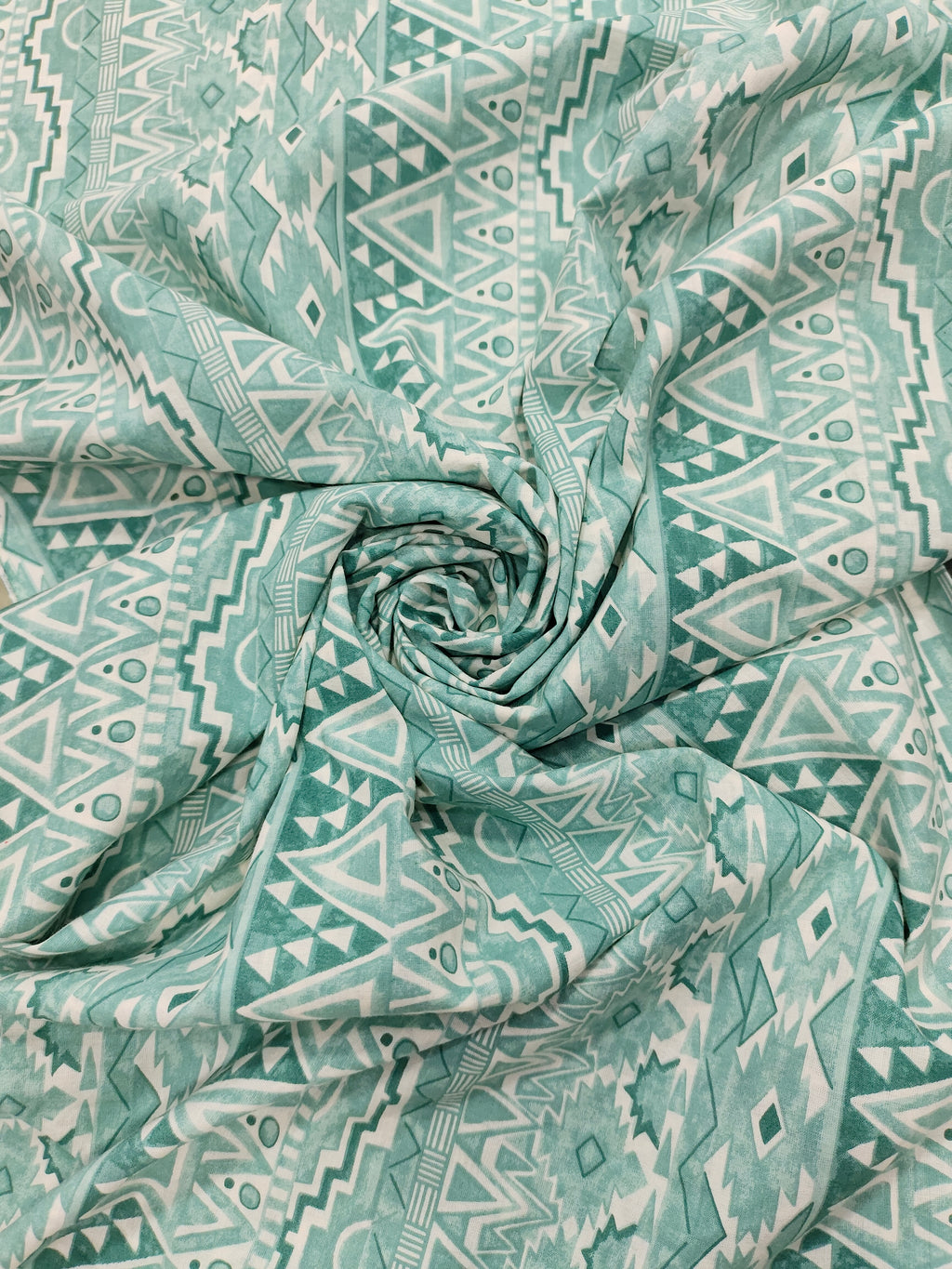 Cream base cotton fabric stripes with pista green and different styles.