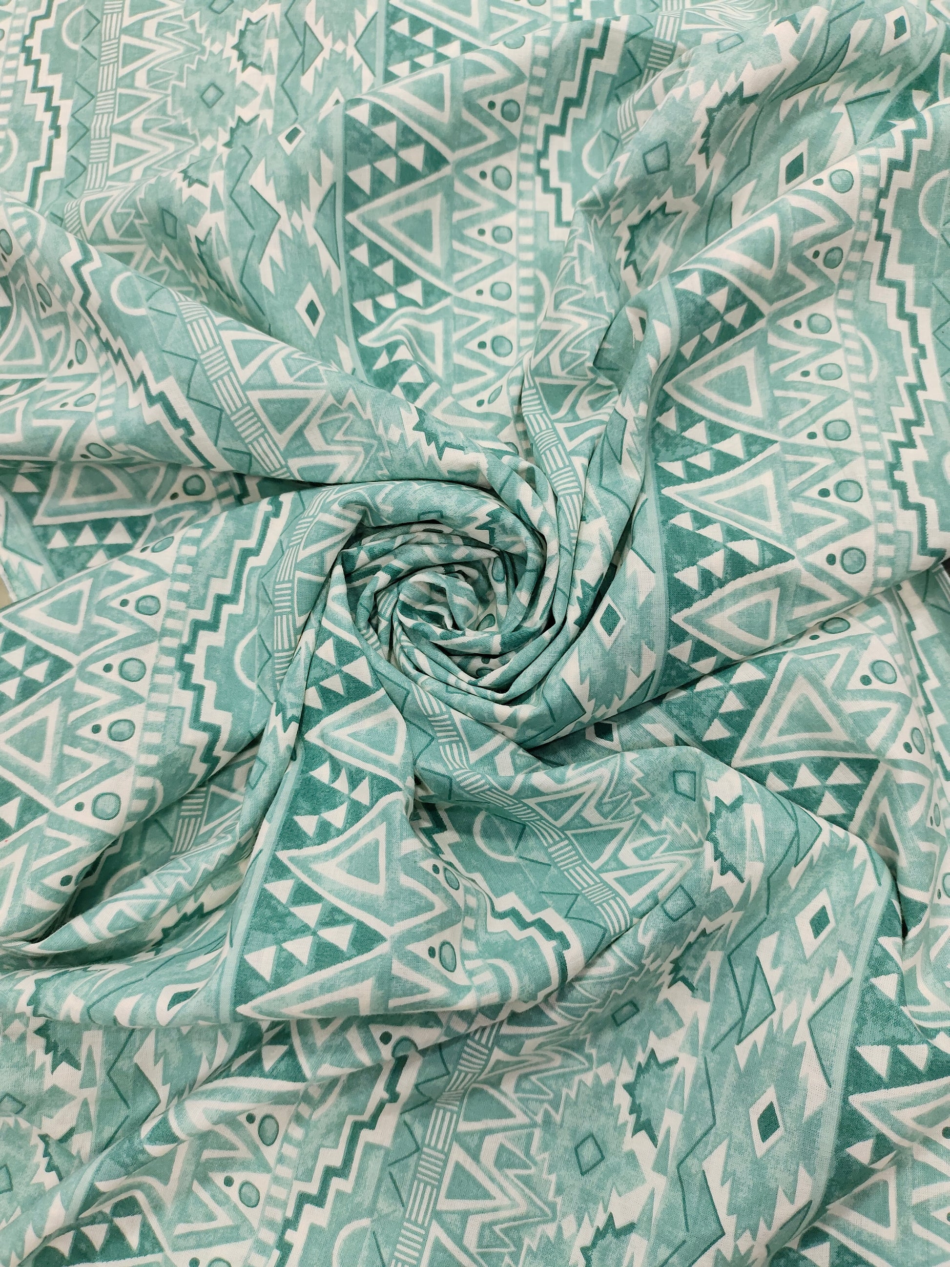 Cream base cotton fabric stripes with pista green and different styles.